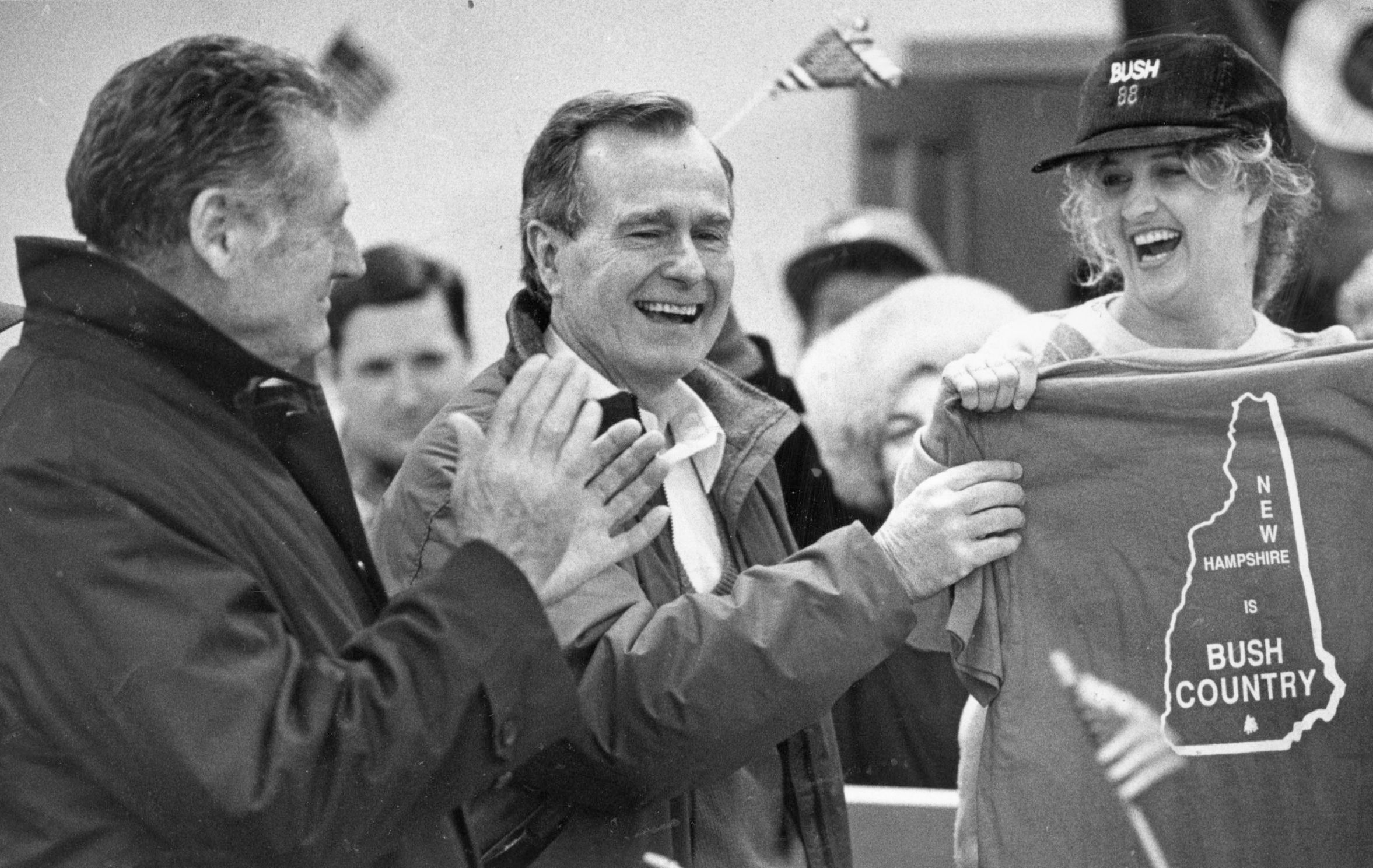 A black and white image of Bush campaigning 