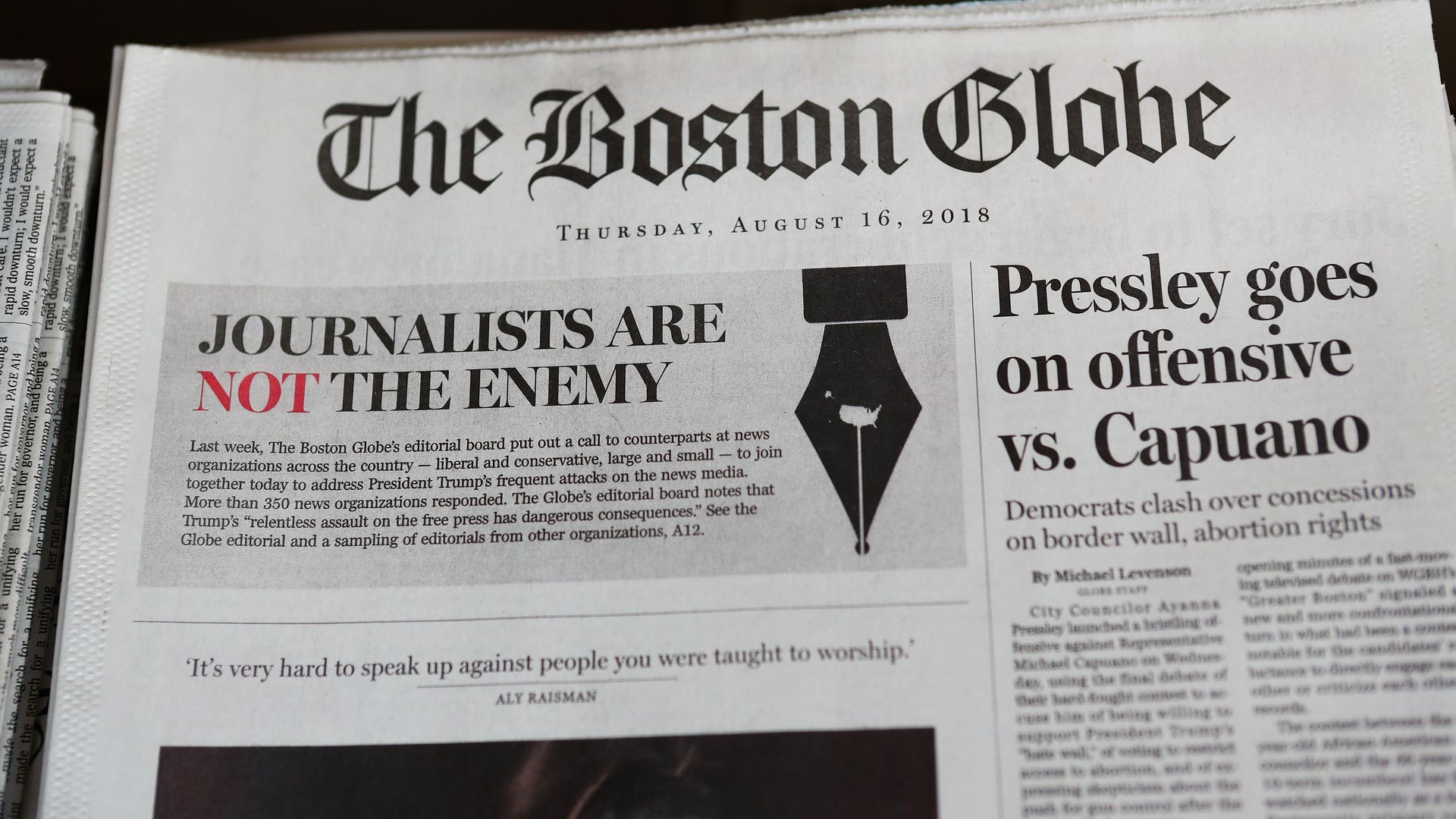 Boston Globe's front page that reads, "Journalists are not the enemy." 
