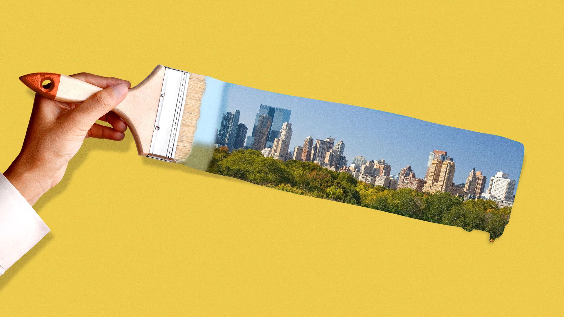 Illustration of a hand holding a paintbrush painting a cityscape