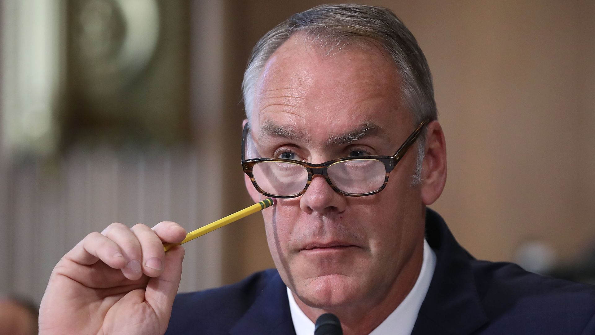 Interior Secretary Ryan Zinke listens to a question during a Senate Energy and Natural Resources Committee hearing on Capitol Hill. 