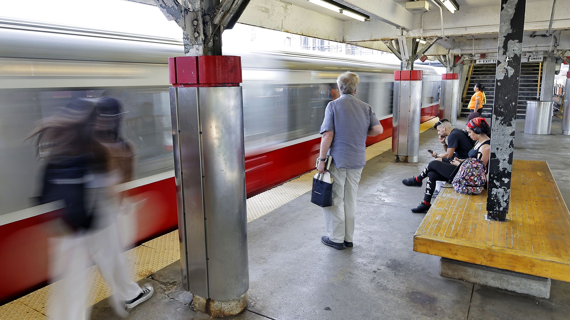 MBTA Riders await a train