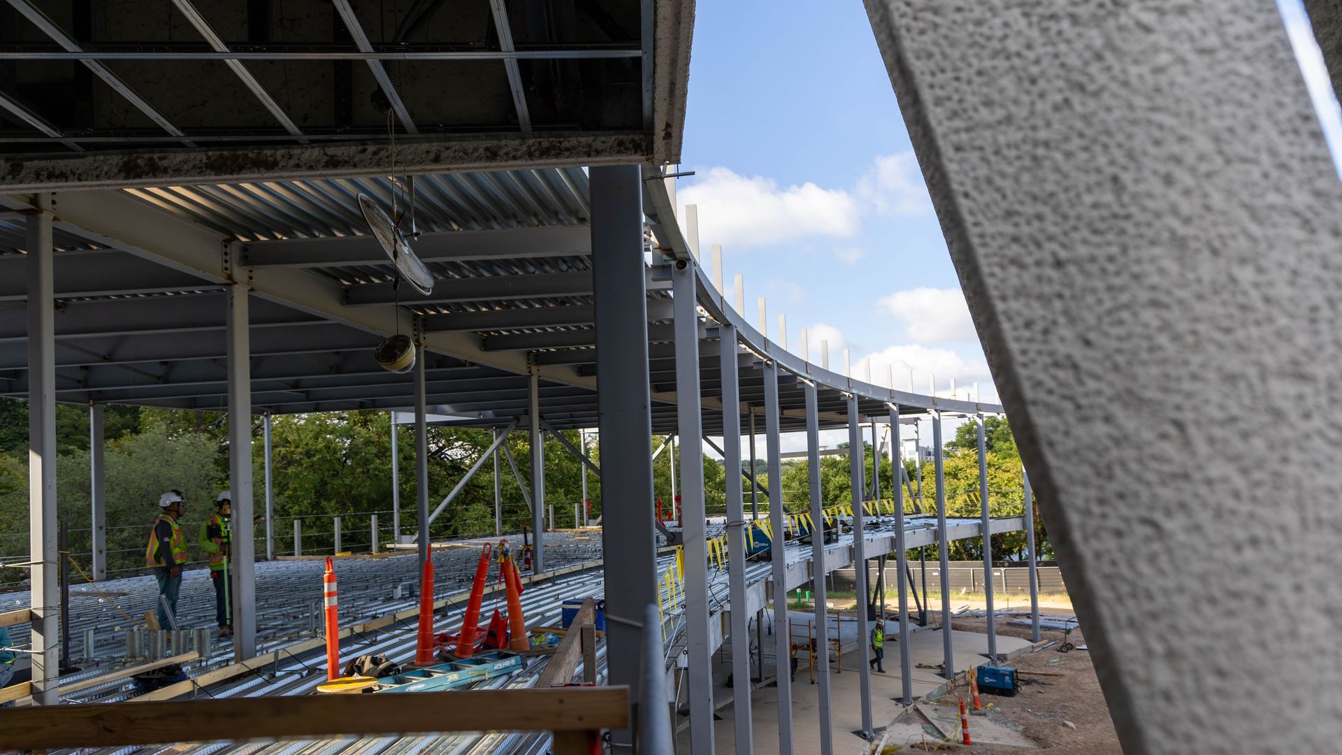 Workers assembling a new section of the Mexican American Cultural Center.
