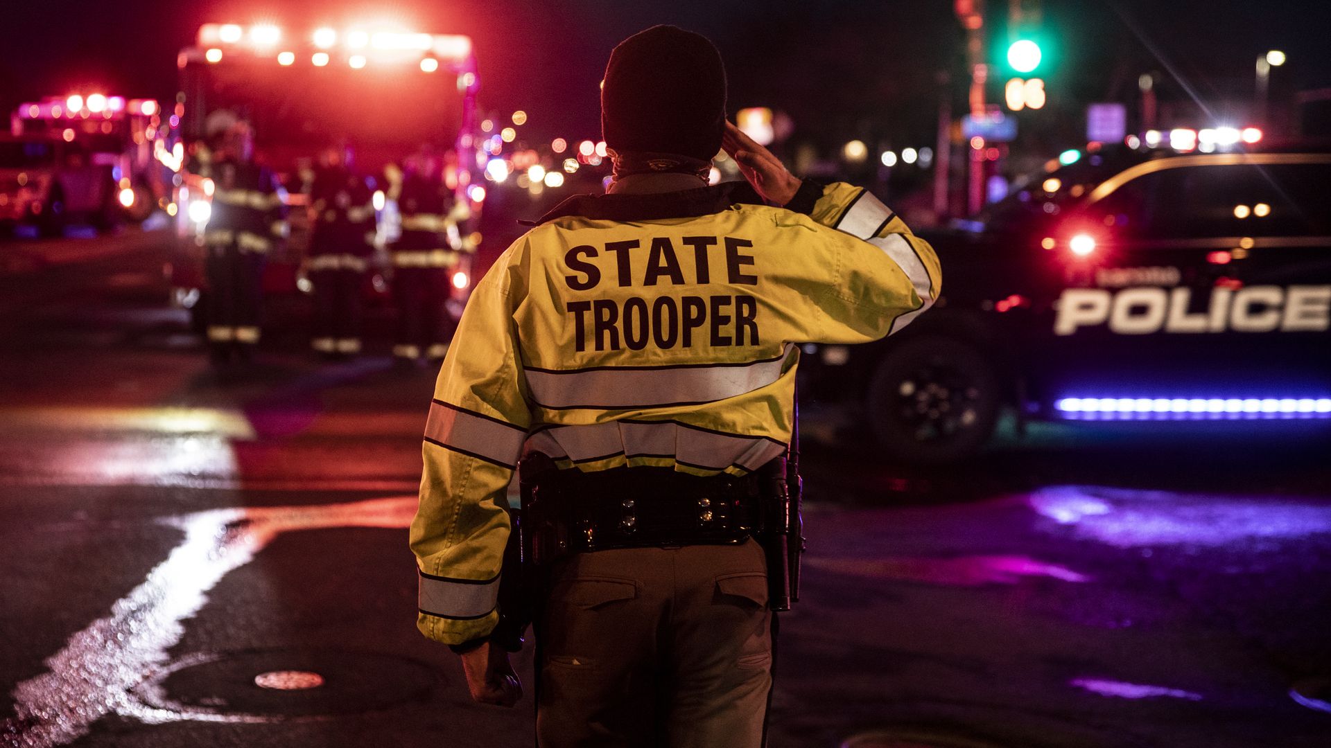 Picture of a police officer saluting 