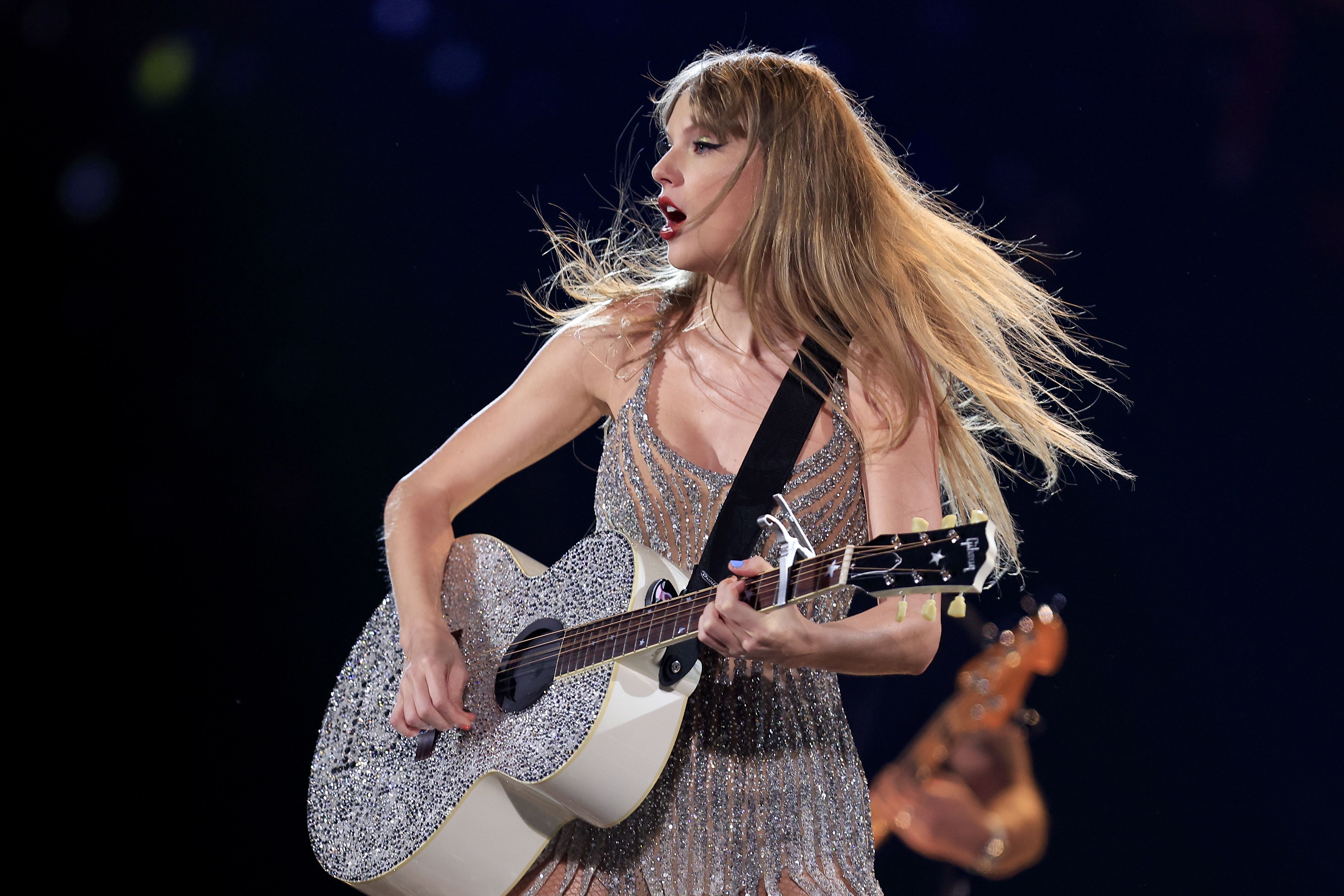 silver noodle dress eras tour Is this the noodle dress at Taylor Swift's exhibit?