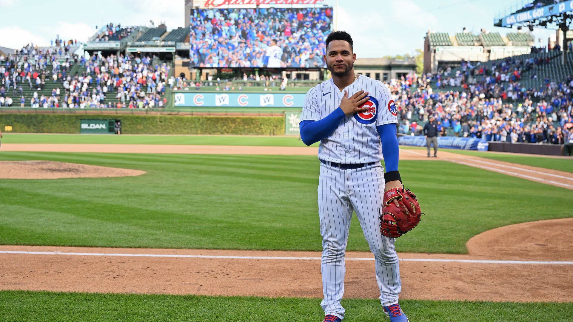 Photo of a baseball player with a glove.