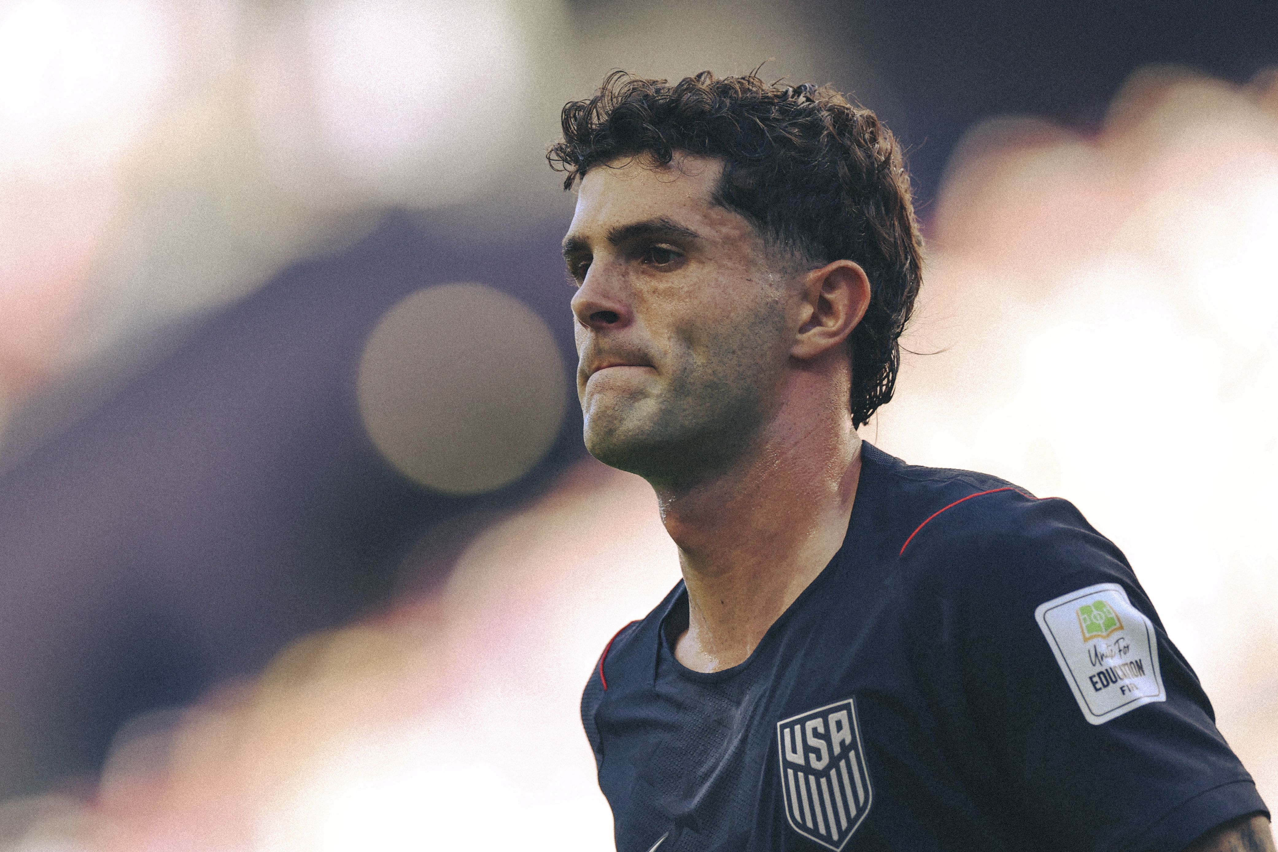 U.S. captain Christian Pulisic reacts on the field during the team's 4-1 World Cup Round of 16 loss to Belgium at Seattle Stadium in Seattle.