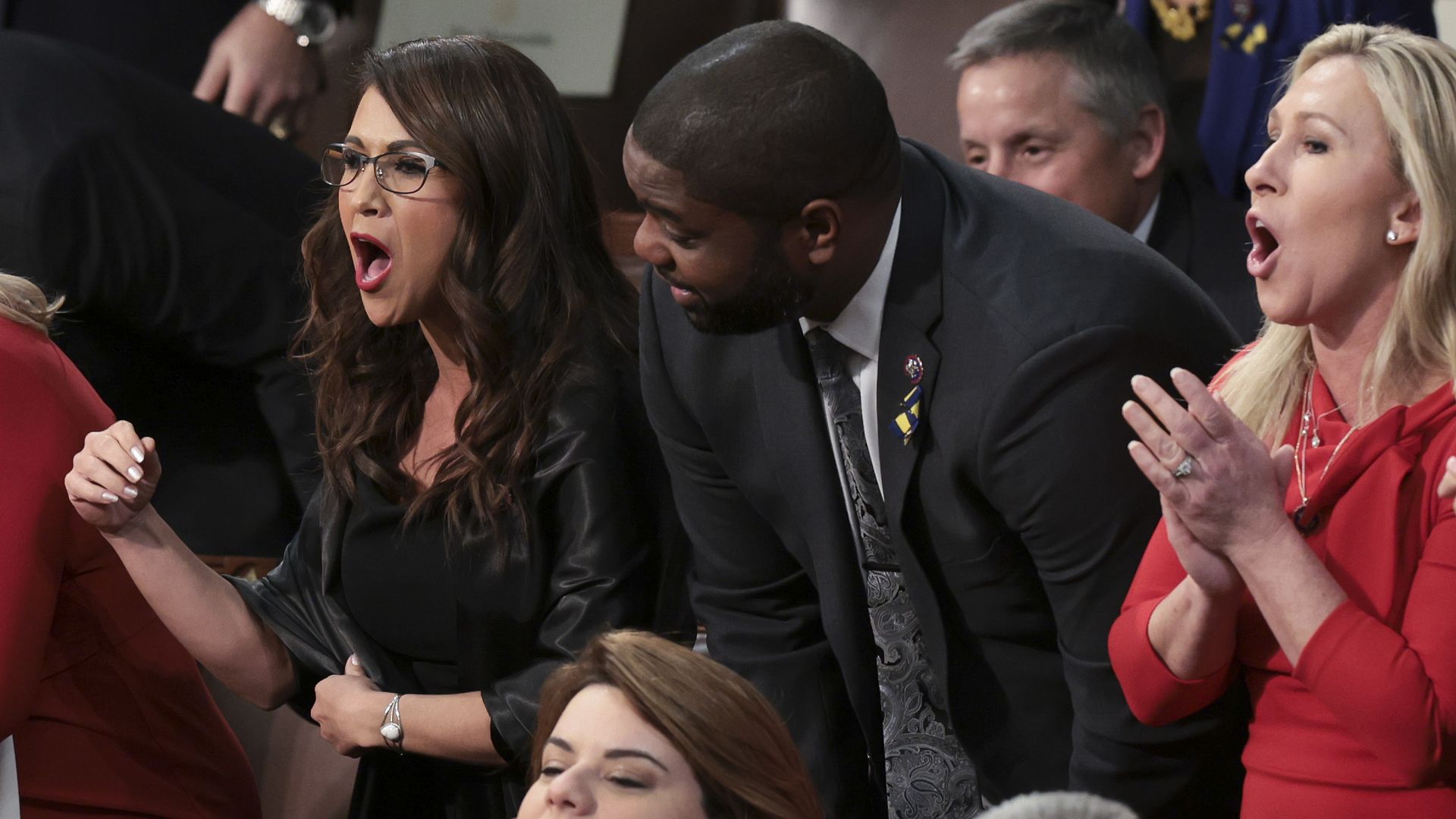 Reps. Lauren Boebert, Byron Donalds and Marjorie Taylor Greene in the House chamber.