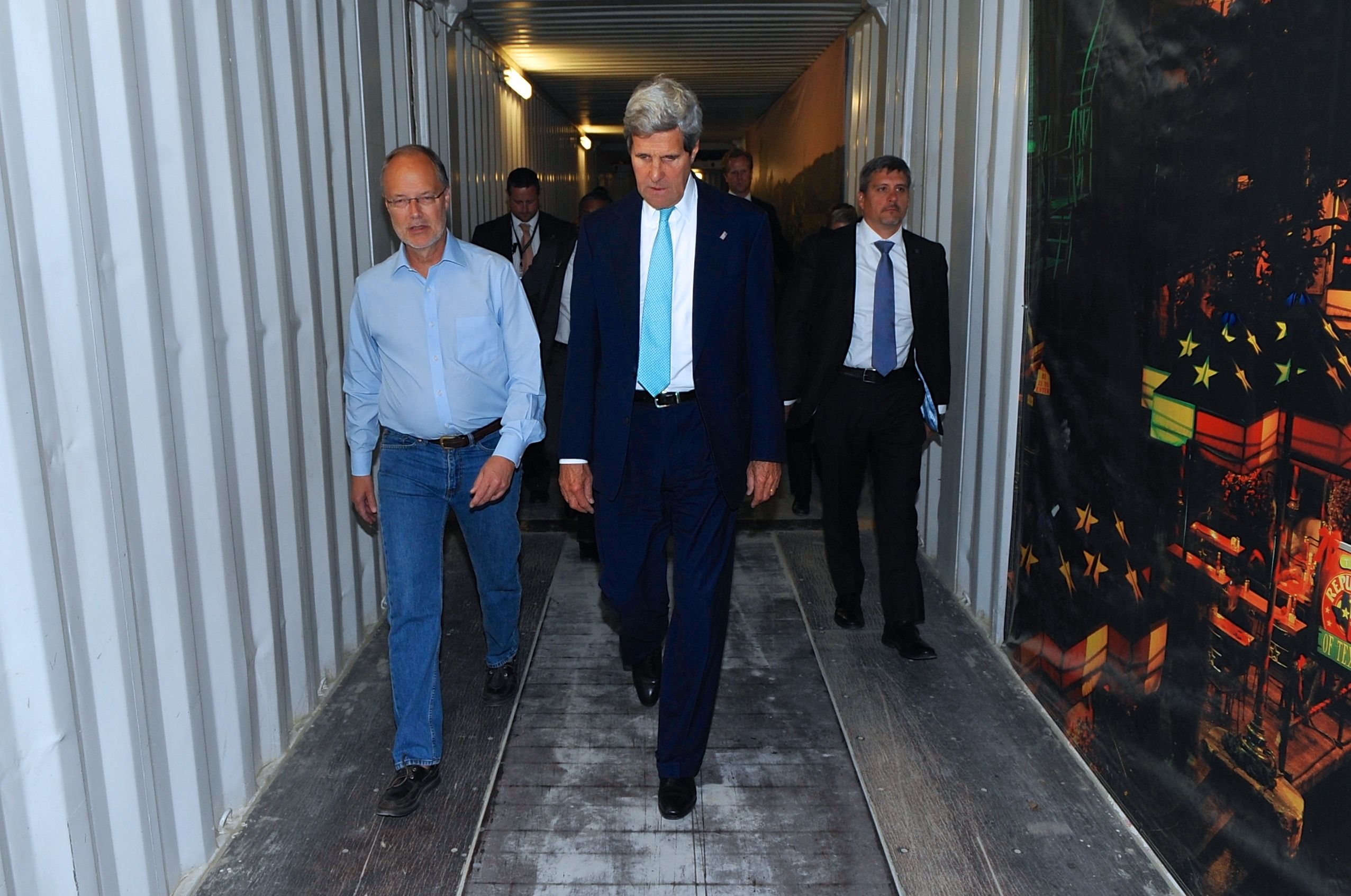 Then-Secretary of State John Kerry is seen walking with U.S. Ambassador to Afghanistan James Cunningham at the U.S. Embassy in Kabul.