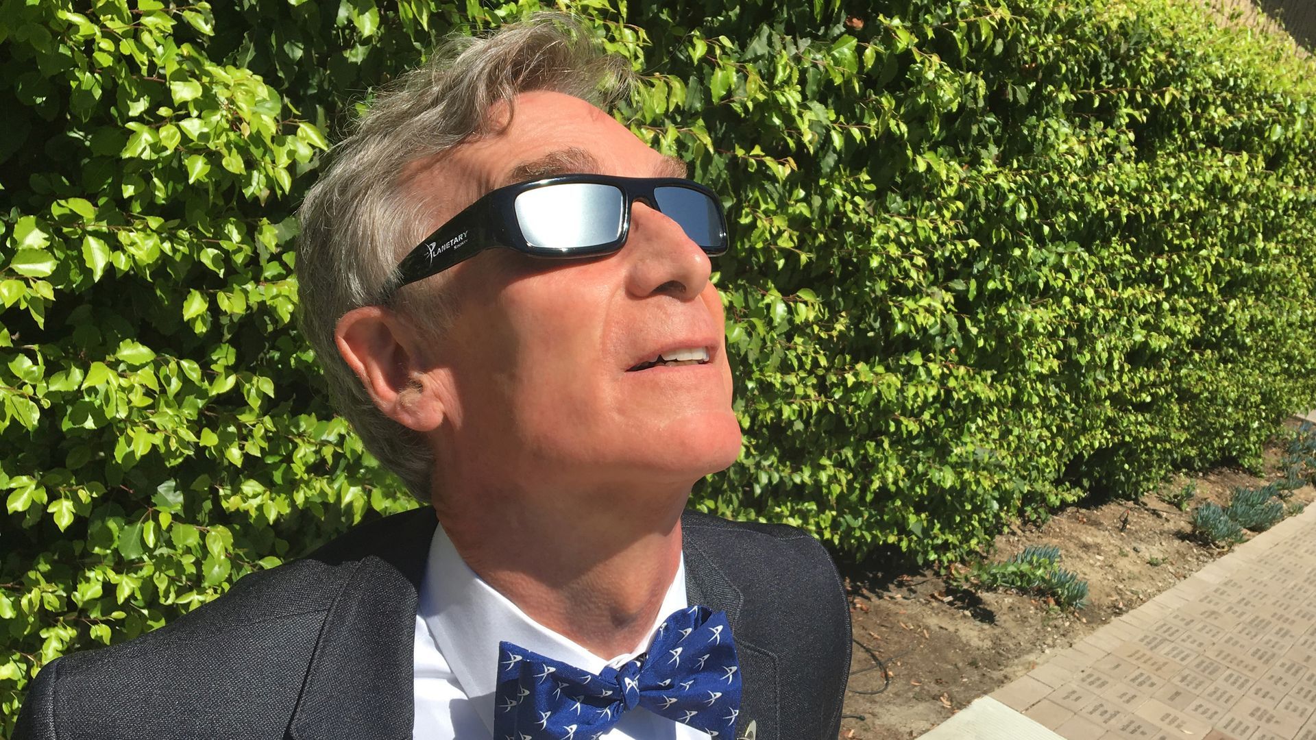 Bill Nye in eclipse glasses.