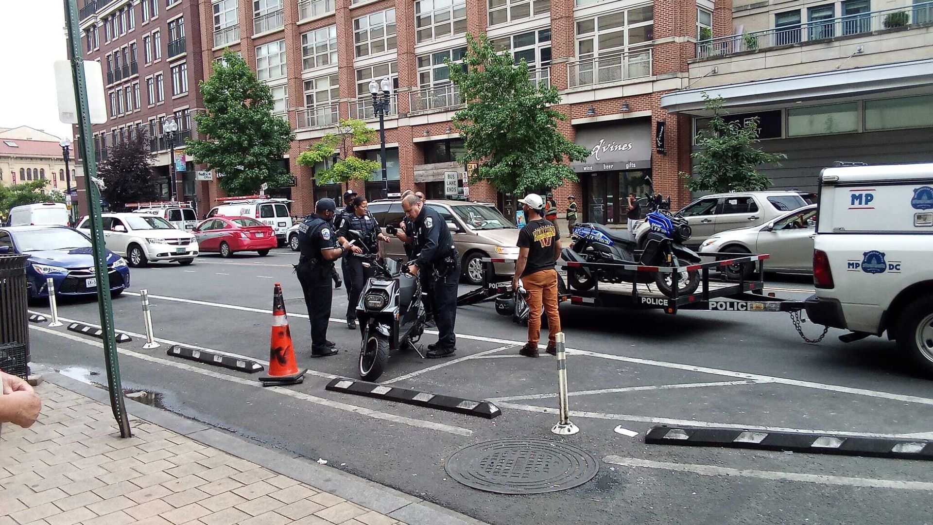D.C. police on the road with two scooters 