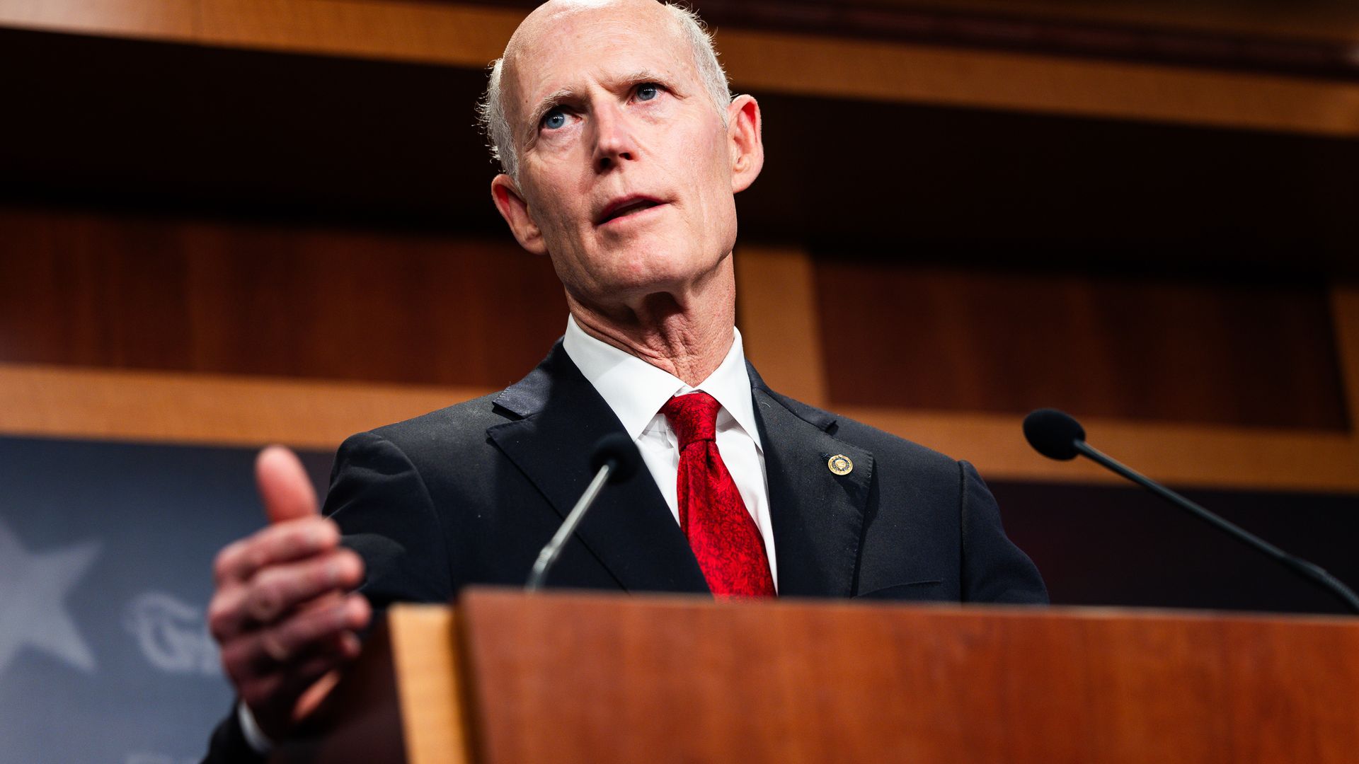 Senator Rick Scott speaks during a news conference at the US Capitol in Washington.