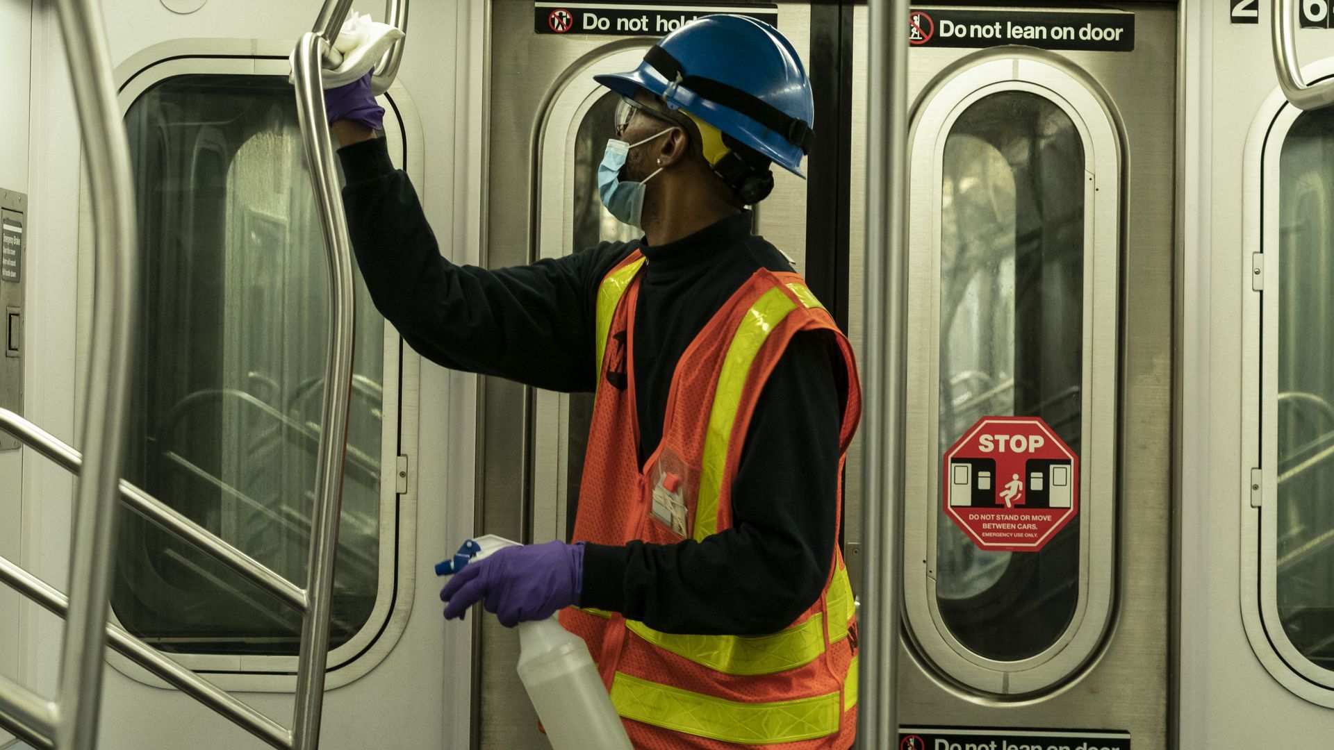 A worker cleans a New York City subway car this month.
