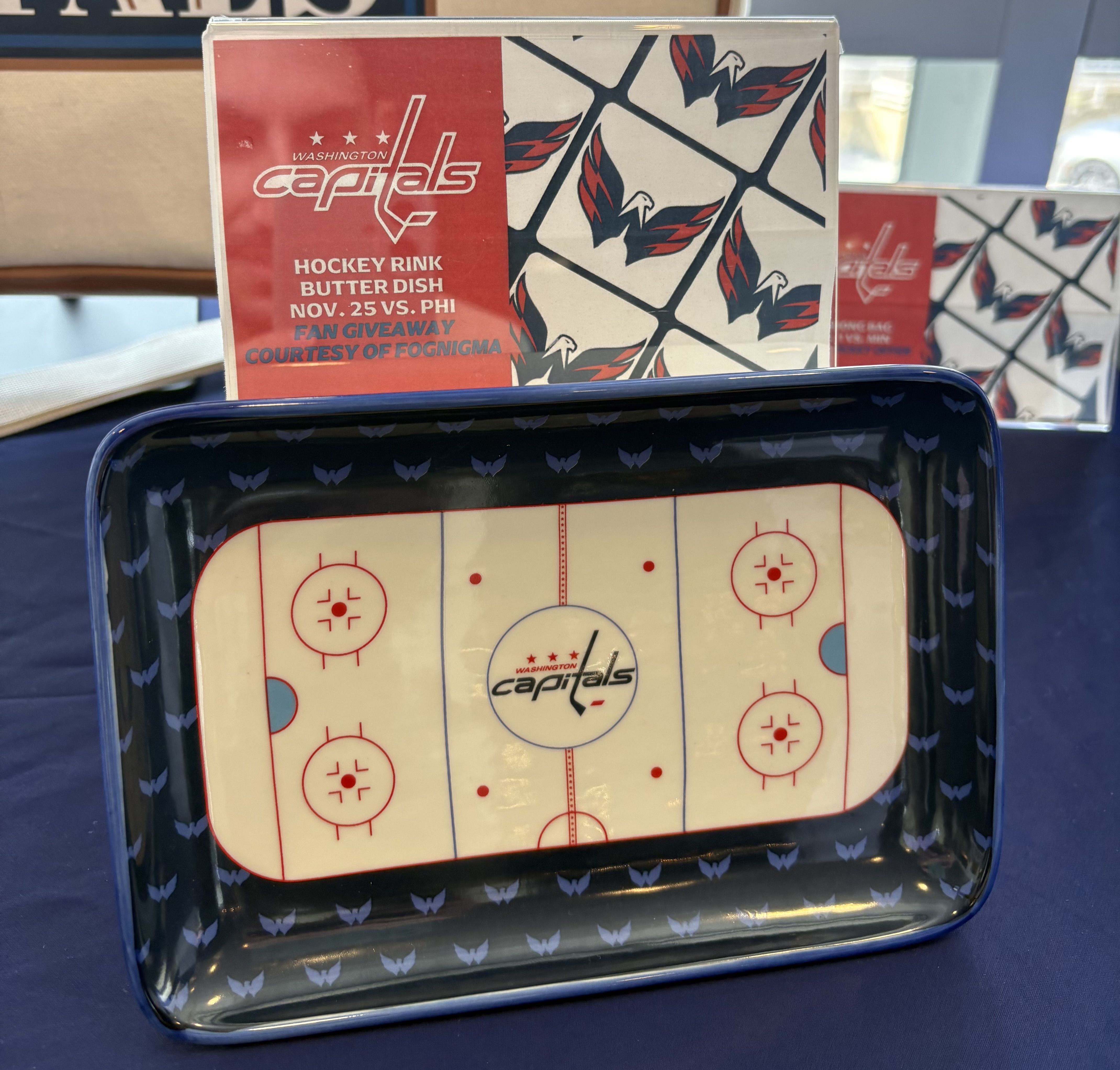 Boxed Washington Capitals hockey rink butter dish featuring a red panel with the Capitals logo and an ice-pattern design; shown on display.