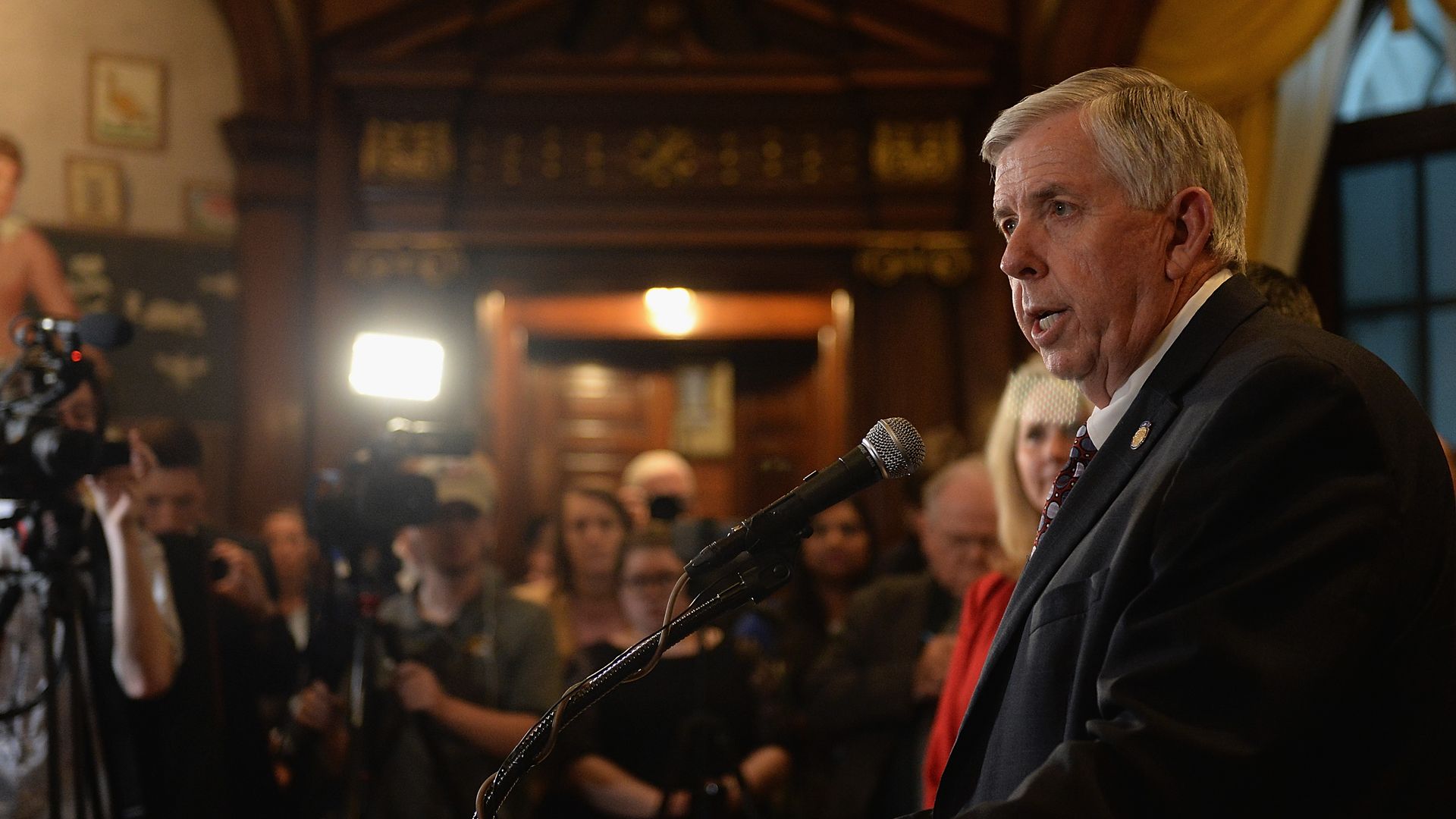 Missouri Governor Mike Parson addresses the media on the last day of legislative session at the Missouri State Capitol Building on May 17, 2019