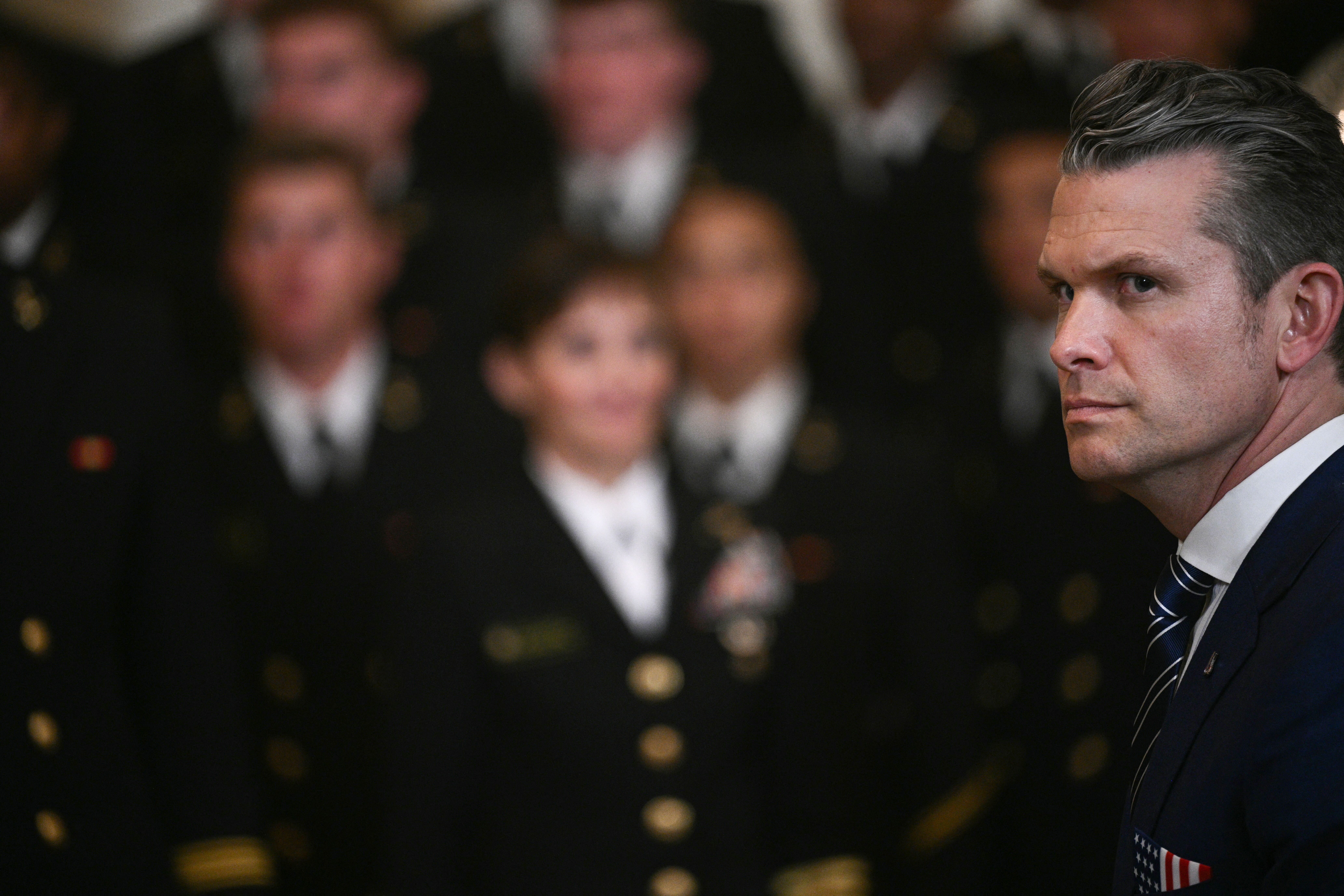 Defense Secretary Pete Hegseth attends a ceremony to present the Commander-in-Chief's Trophy to the Naval Academy in the East Room last week.