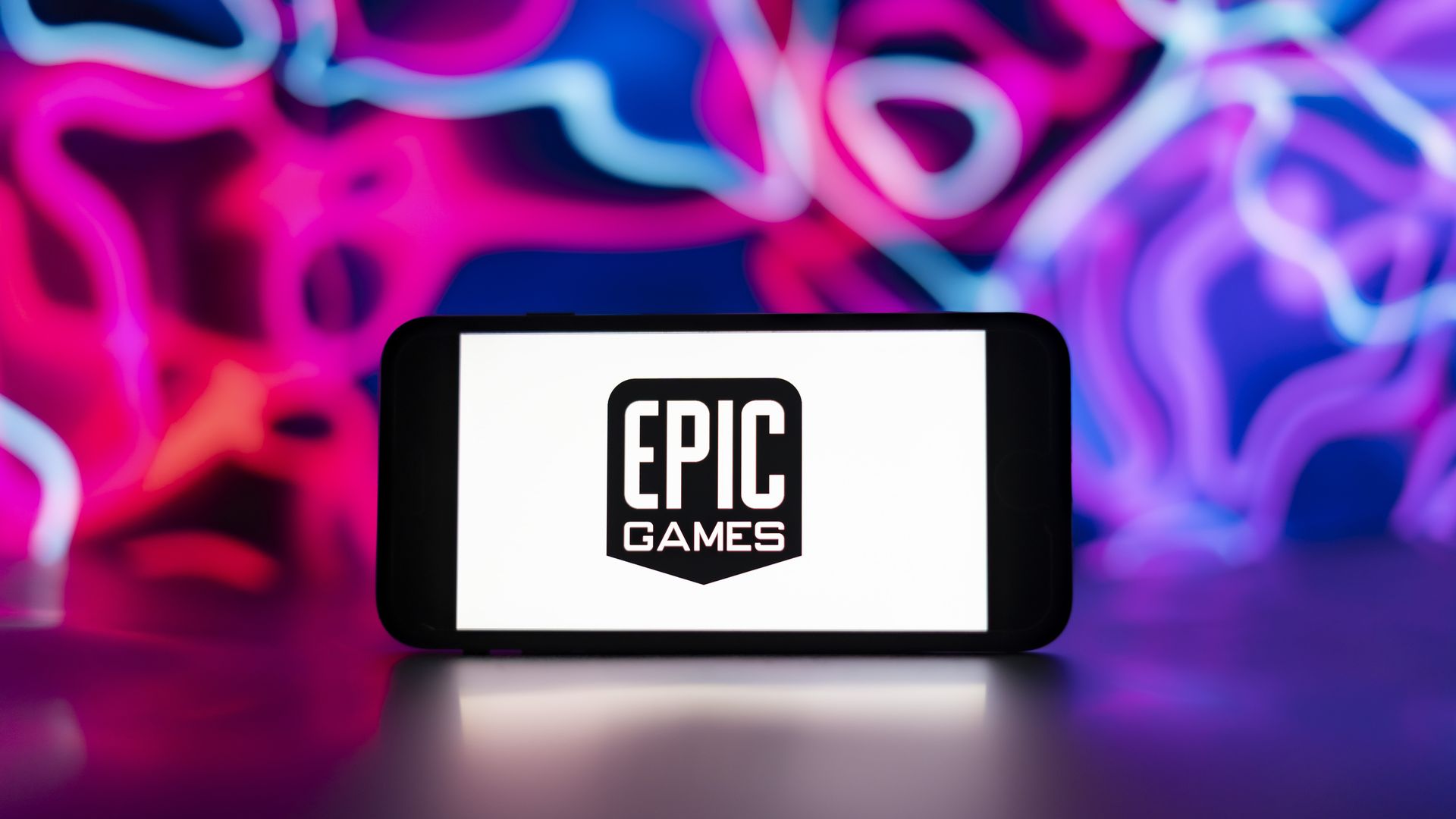 INDIA - 2023/12/13: In this photo illustration, the Epic games logo is seen displayed on a mobile phone screen. (Photo Illustration by Idrees Abbas/SOPA Images/LightRocket via Getty Images)