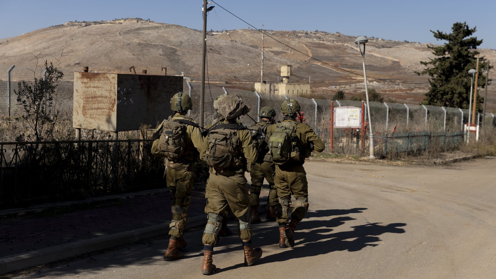 Israeli soldiers patrol at the agricultural settlement near the Lebanese border in the Upper Galilee on December 2, 2024 in Manara, Israel. 