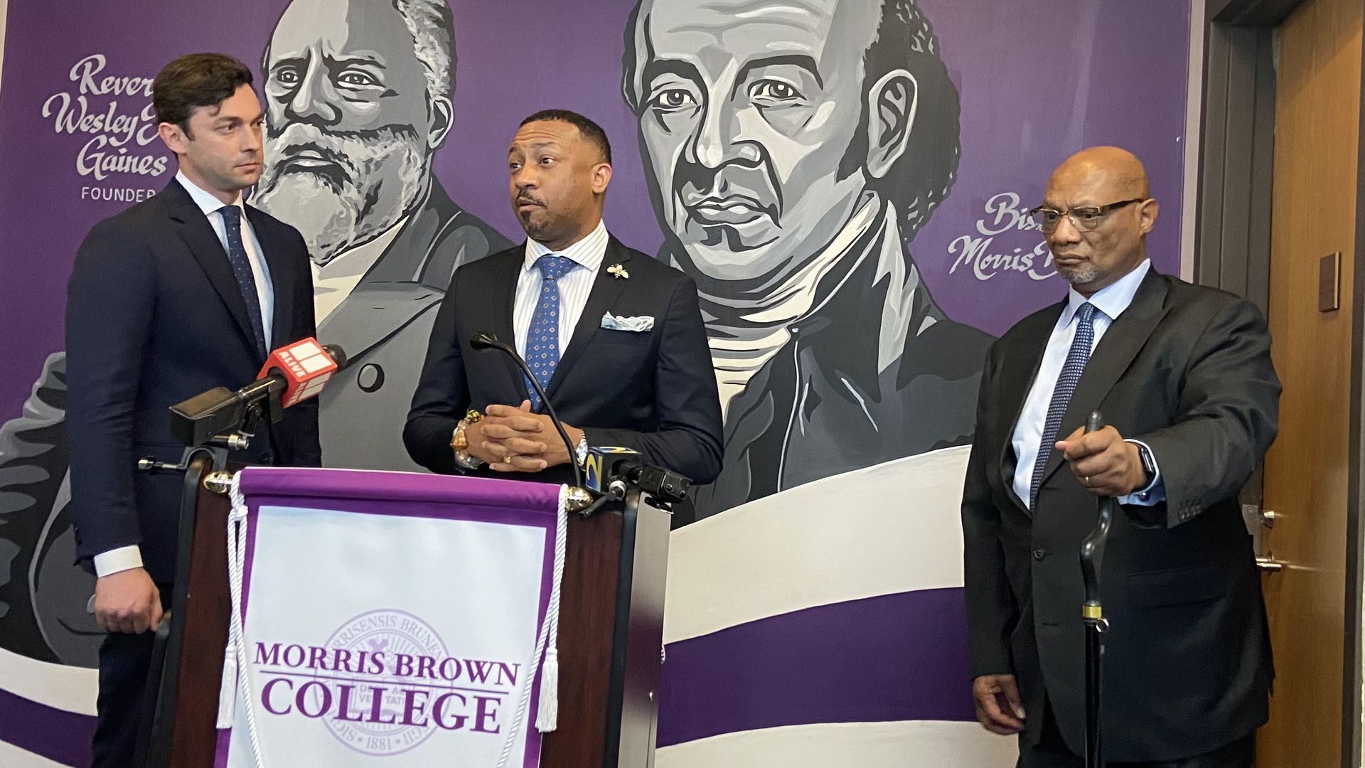 Jon Ossoff listens to Morris Brown College pres. Kevin James