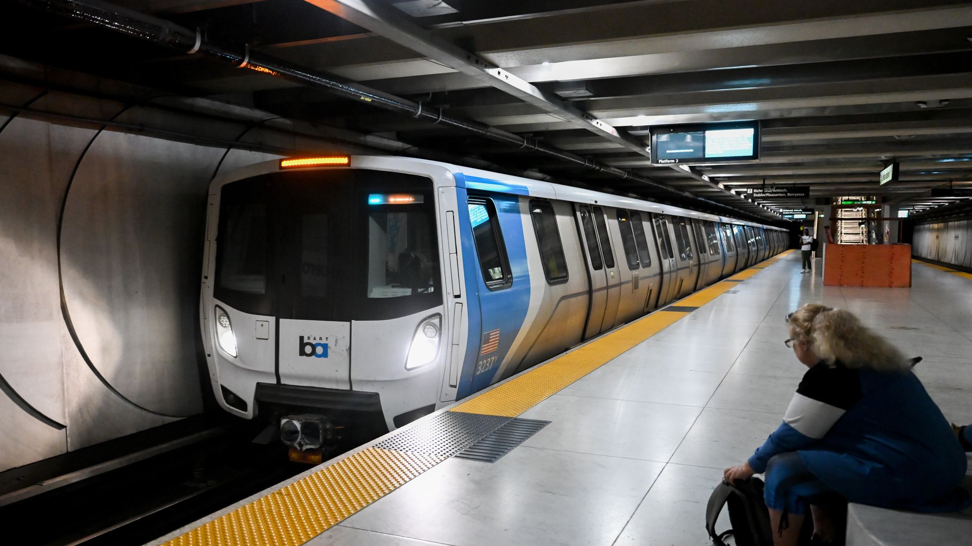 A BART train stops at a San Francisco stop.