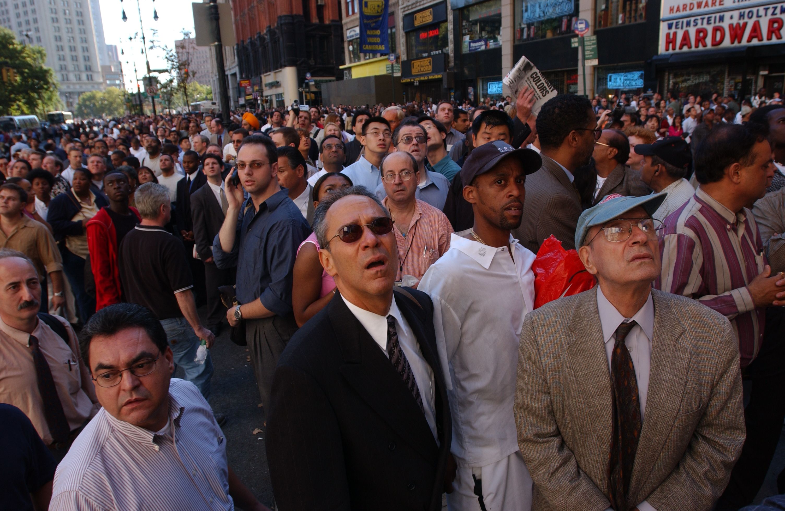 Onlookers watch as the World Trade Center burns on Sept. 11, 2001. Photo: Spencer Platt/Getty Images