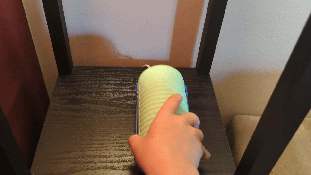 A gif showing a hand picking up and hanging up a Tin Can landline phone.