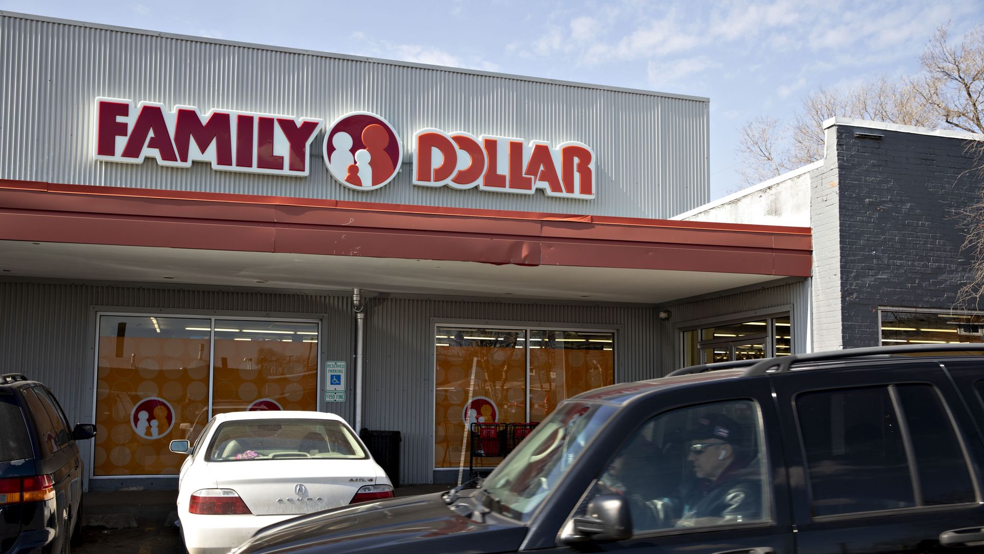 Vehicle driving by Family Dollar store
