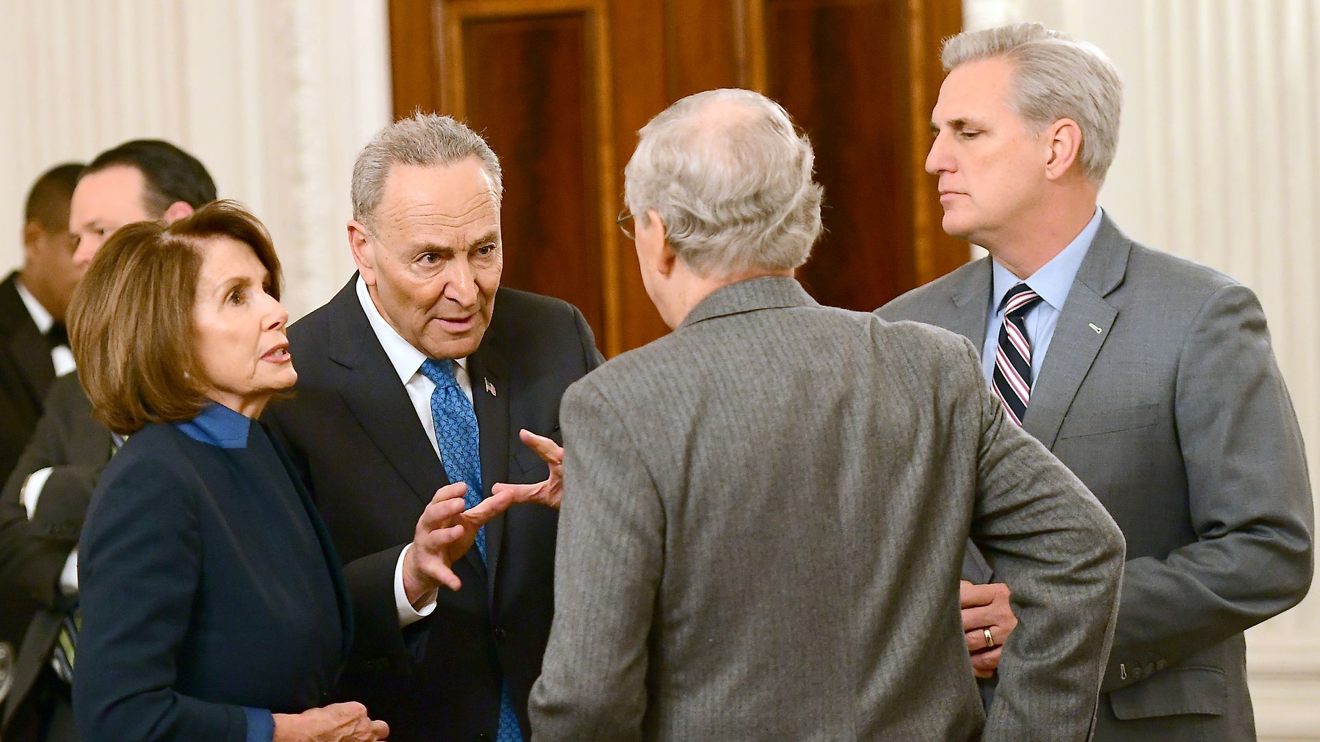 Nancy Pelosi, Chuck Schumer, Mitch McConnell and Kevin McCarthy talk at a reception held by President Donald Trump 