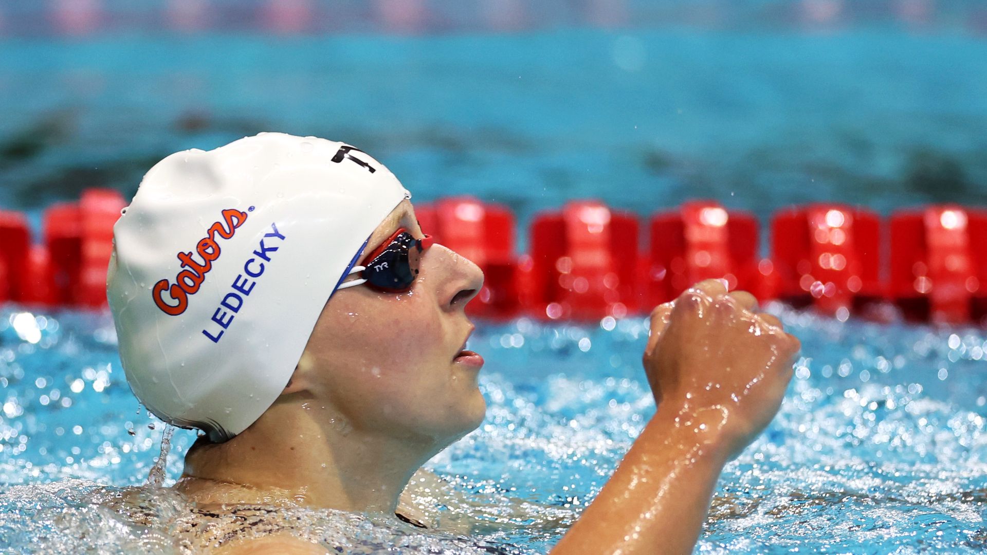 Katie Ledecky reacts after setting a world record in the Women's 800m Freestyle final at Indiana University Natatorium on November 05, 2022 in Indianapolis, Indiana.