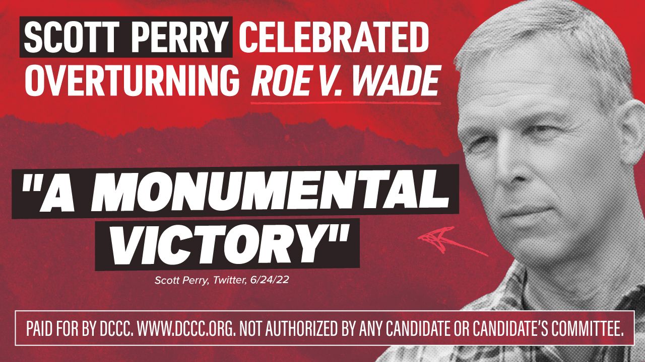 A billboard saying "Scott Perry celebrated overturning Roe v. Wade, which quotes him calling it  "A monumental victory."