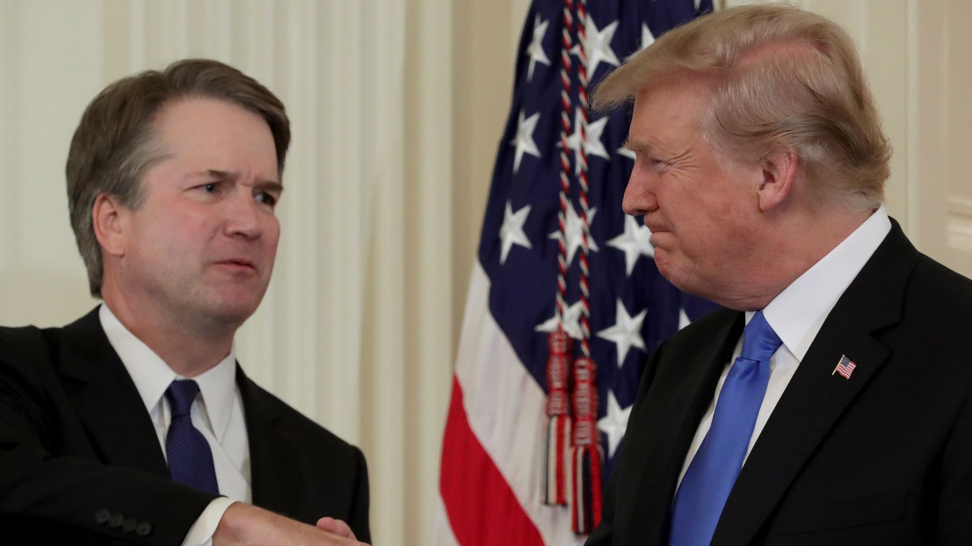 Trump shaking hands with Kavanaugh