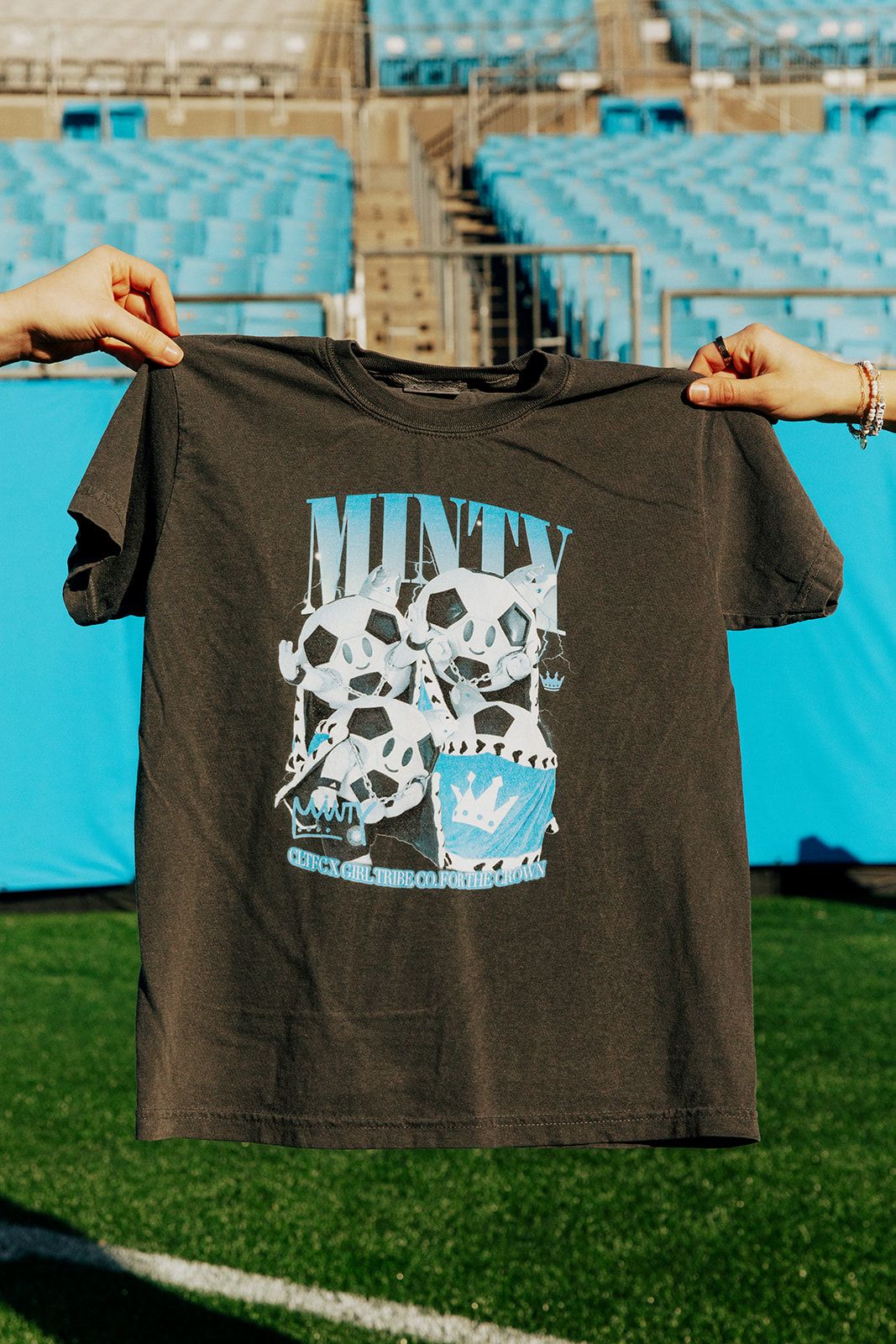 Sir Minty Charlotte FC T-shirt.