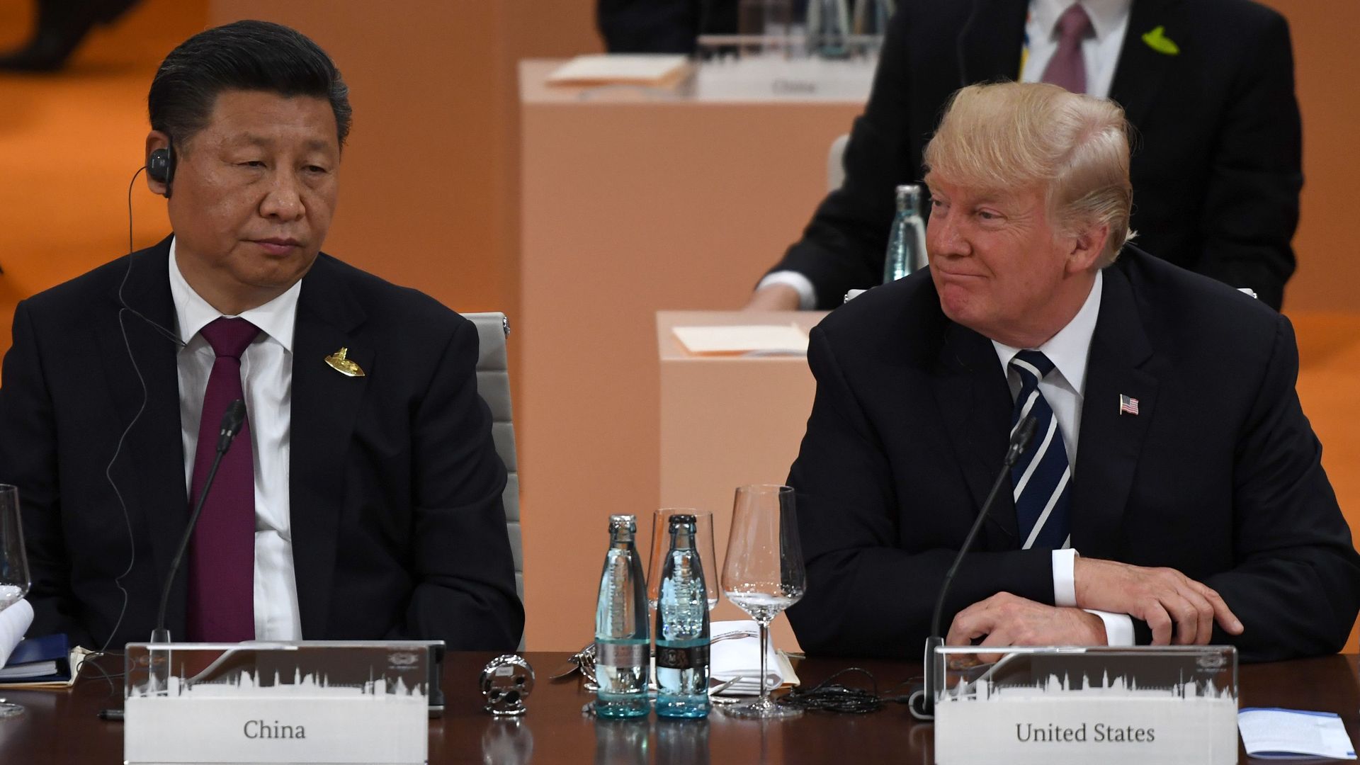 China's President Xi Jinping (L) and US President Donald Trump attend a working session on the first day of the G20 summit in Hamburg, northern Germany, on July 7, 2017.