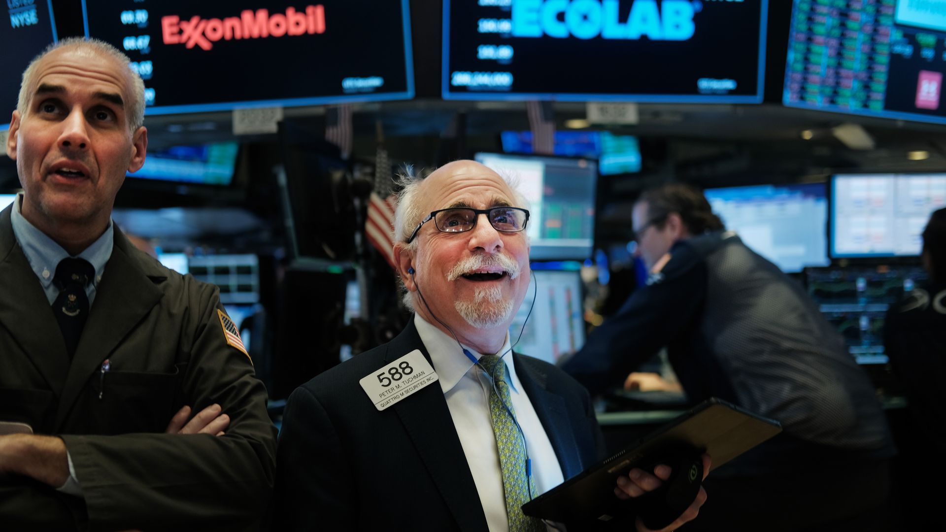 Traders work on the floor of the NYSE.