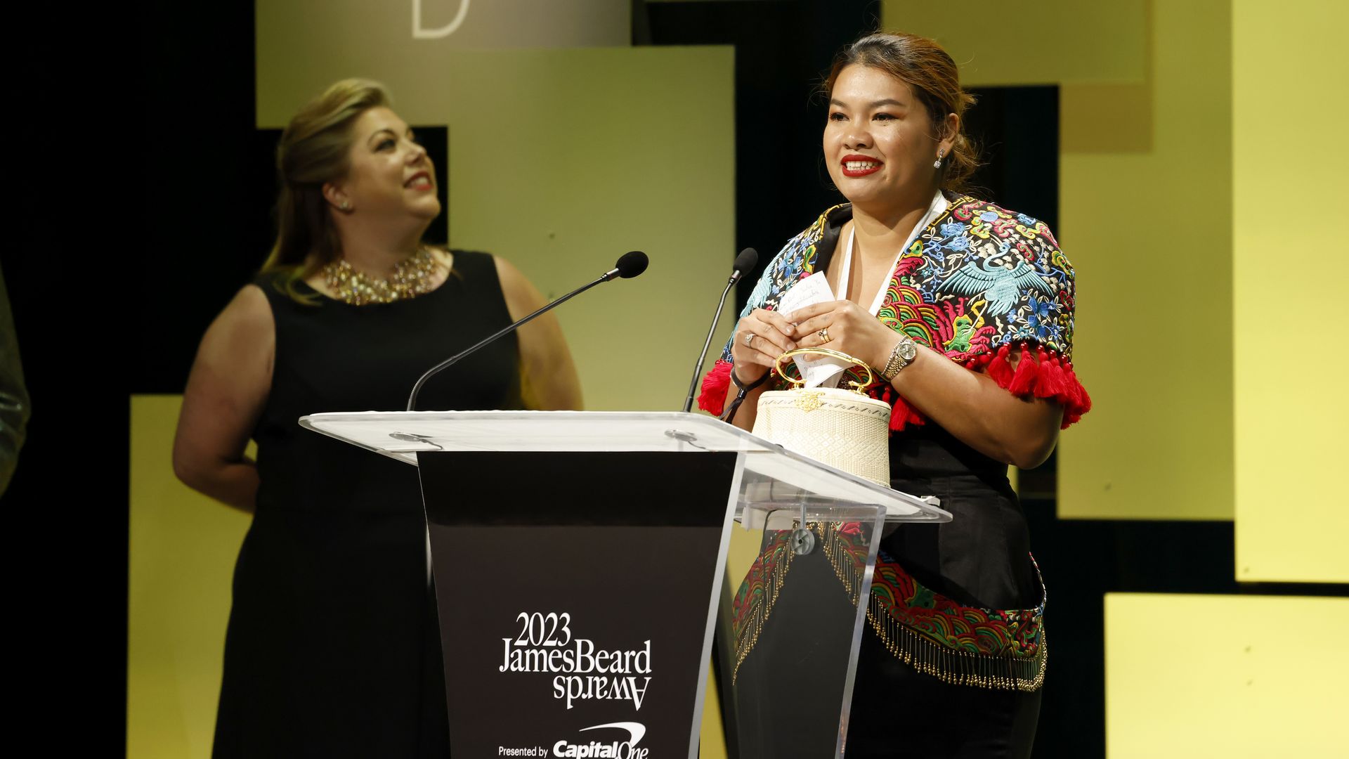 A photo of a chef receiving an award at the James Beard Award ceremony
