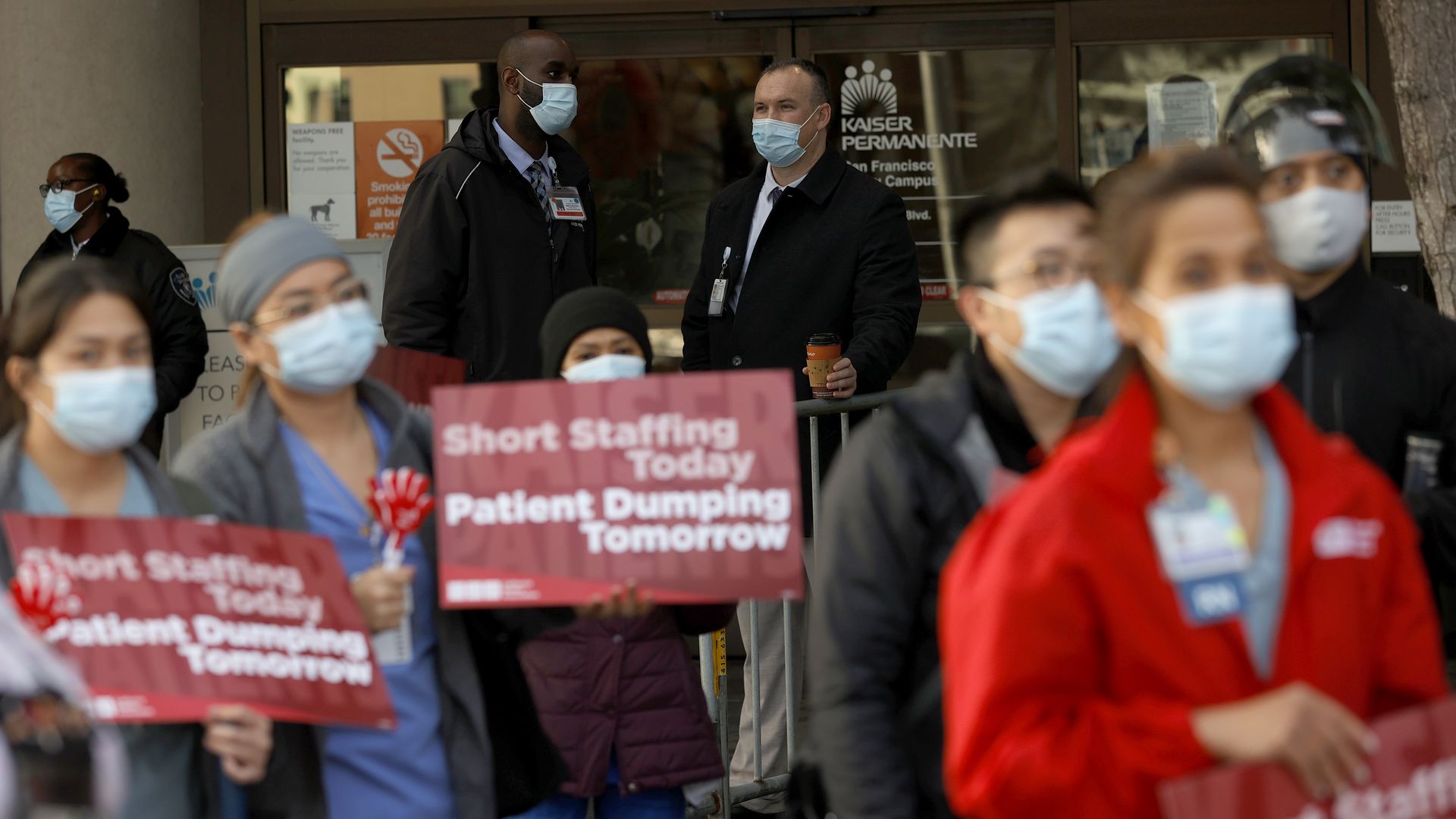 Kaiser Permanente security guards monitor an informational picket outside of the Kaiser Permanente San Francisco Medical Center on November 10, 2021 in San Francisco, California. 