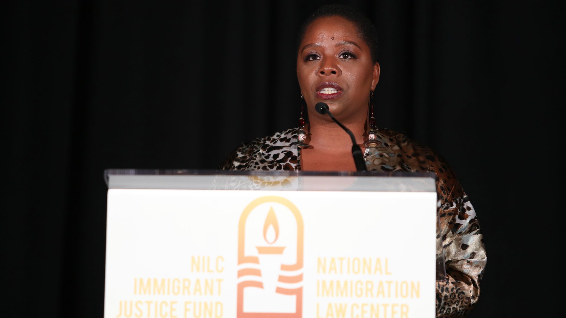 Patrisse Cullors speaks at an awards ceremony