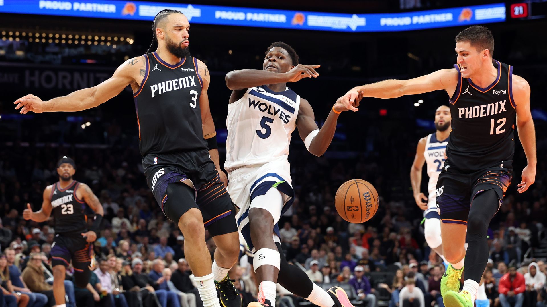 Anthony Edwards gets the ball stripped from him by a Suns player 