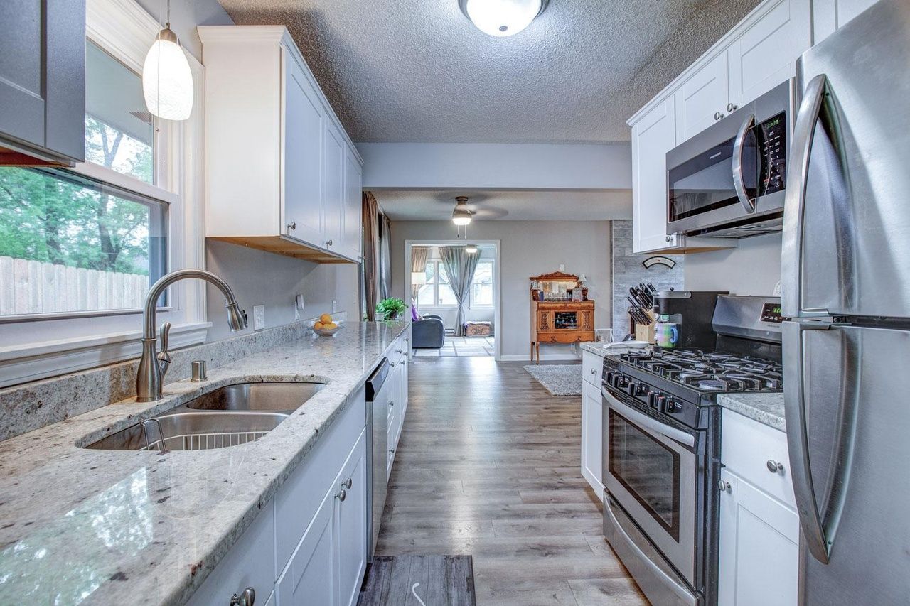 kitchen with granite counters and stainless appliances