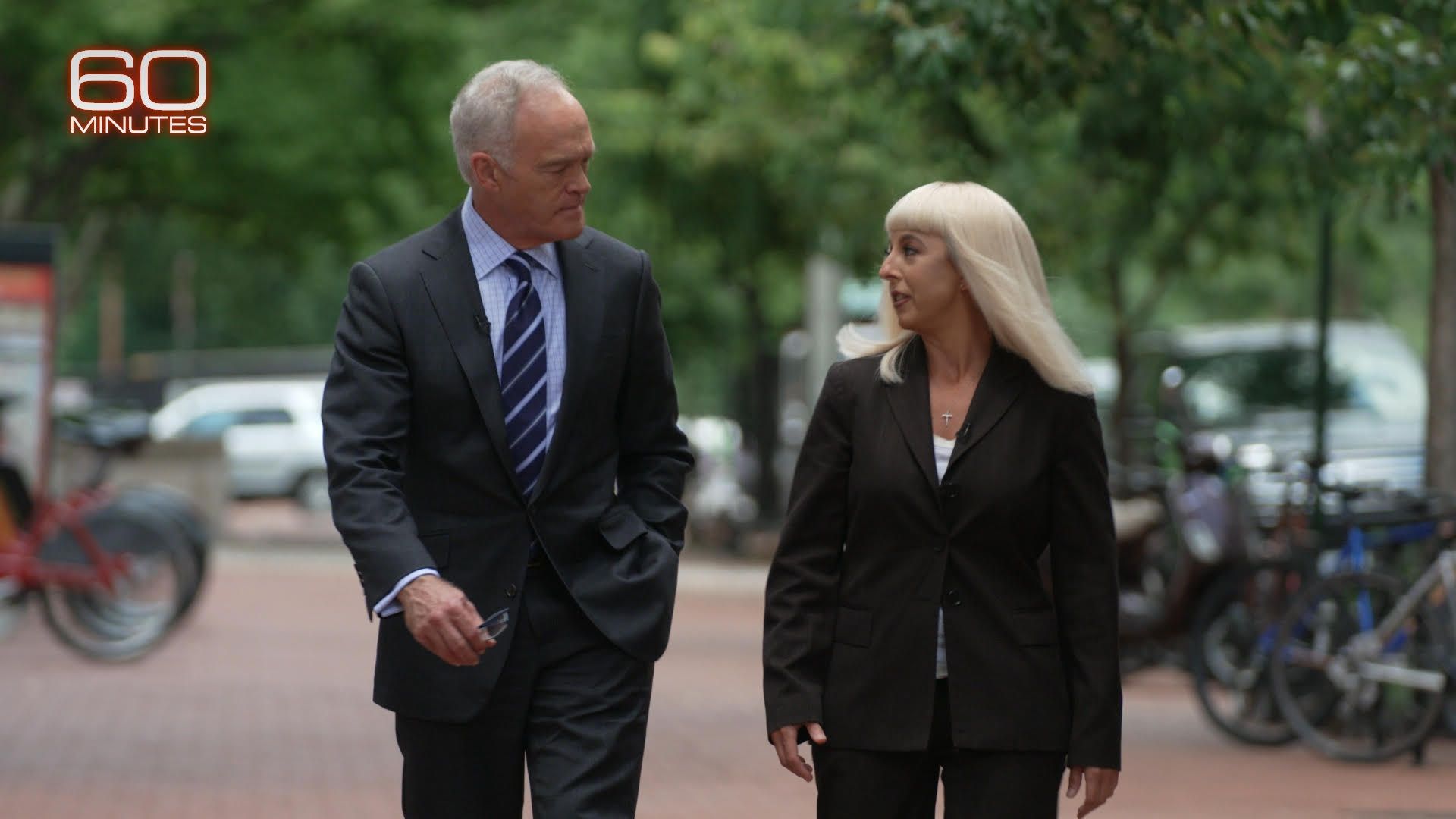 CBS' Scott Pelley with an FBI agent whom they called "Carrie" on "60 Minutes."  CBS is disguising her & not using her last name because she’s still a working FBI agent. 