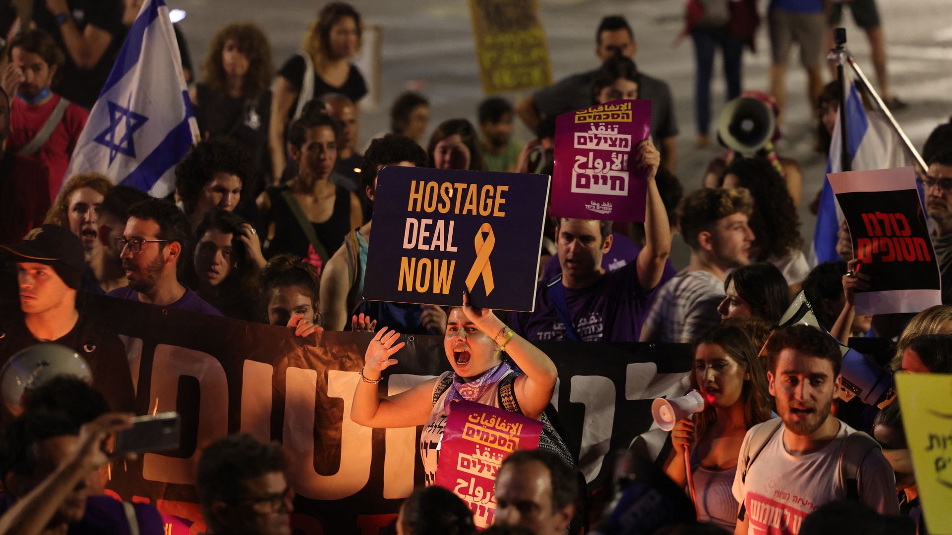 Relatives and supporters of Israelis held hostage by Palestinian Hamas militants in Gaza since the October 7 attacks, demonstrate to call for their release in Tel Aviv on June 1, 2024.