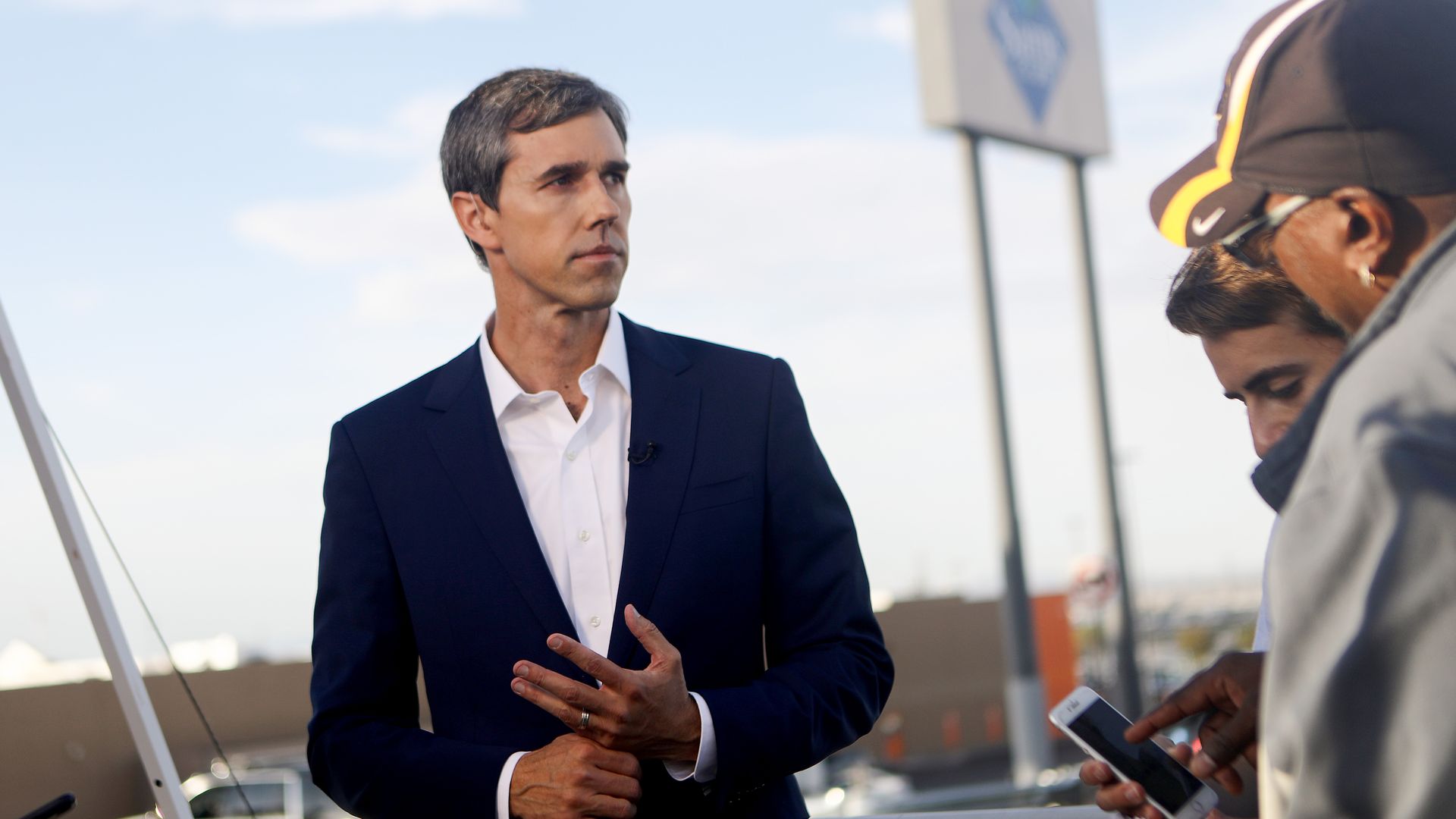 Democratic presidential candidate and former Rep. Beto O’Rourke prepares to be interviewed outside Walmart near the scene of a mass shooting which left at least 20 people dead