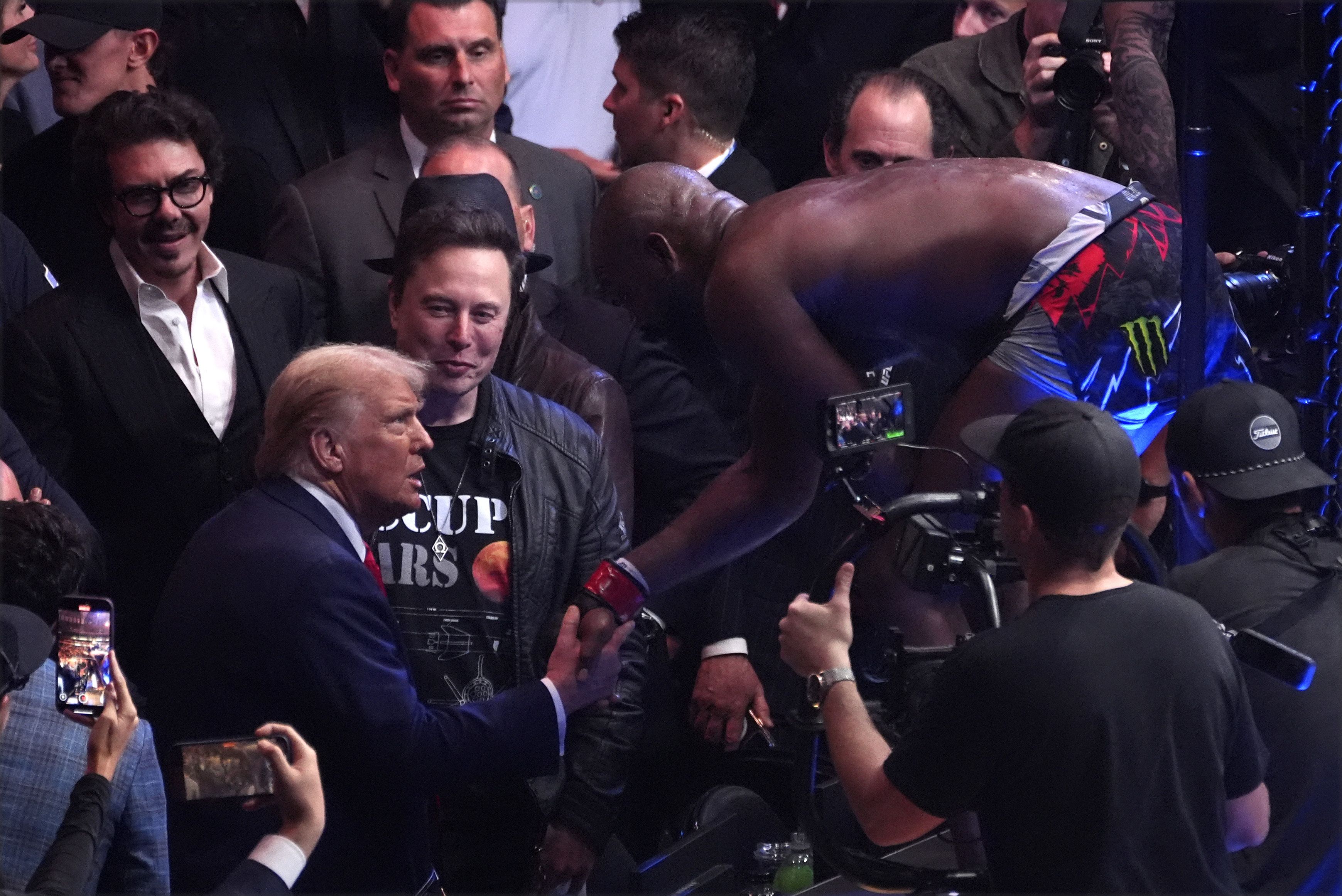 President-elect Donald Trump greets Jon Jones after he defeated Stipe Miocic at UFC 309 at Madison Square Garden, early Sunday, Nov. 17, 2024, in New York. (AP Photo/Evan Vucci)