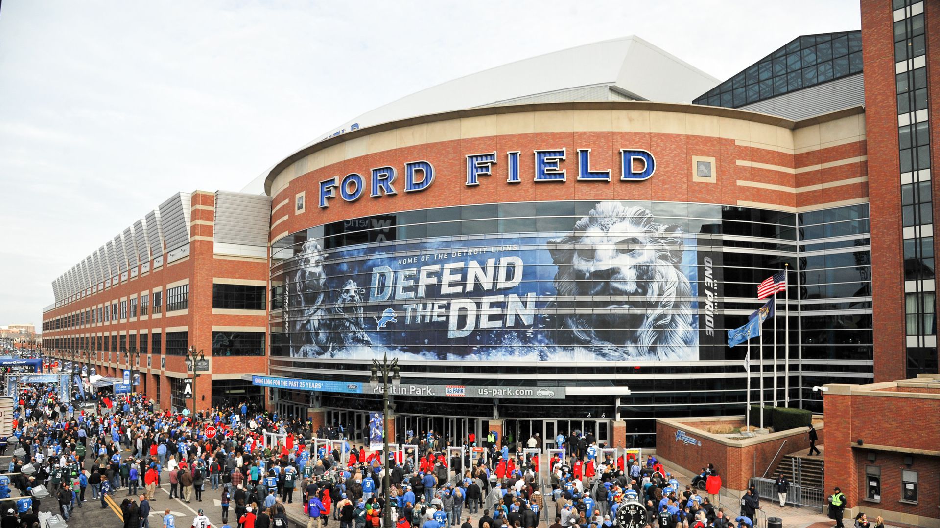 Detroit Lions fans gather at the gates to enter the stadium prior to the game on Thanksgiving Day at Ford Field, Detroit, Michigan. 