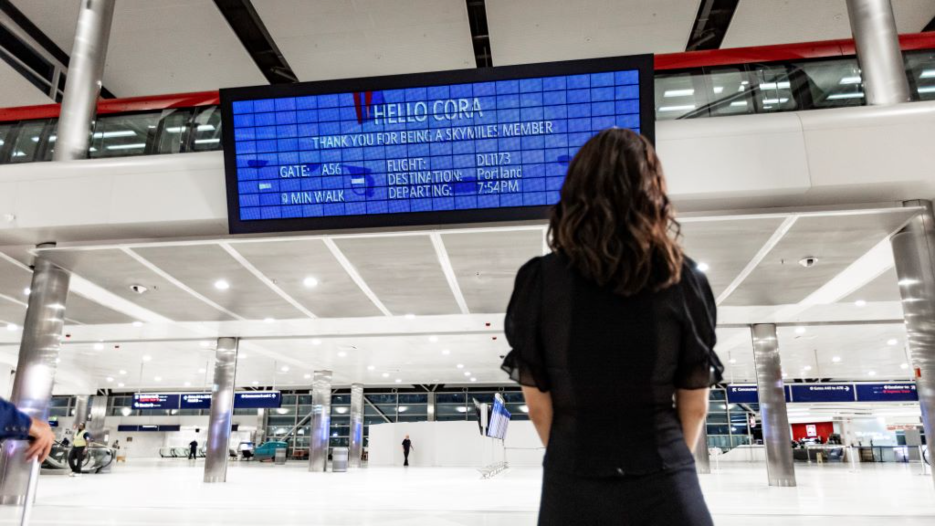 Delta's Parallel Reality facial recognition airport departure board.