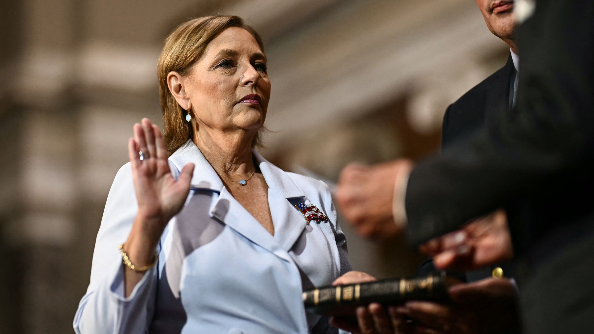 Darline Graham Nordone, sister of Lindsey Graham, is ceremonially sworn in as a US Senator by Senator Charles Grassley, Republican from Iowa, (out of frame) in the Old Senate Chamber at the US Capitol in Washington, DC, on July 14, 2026.