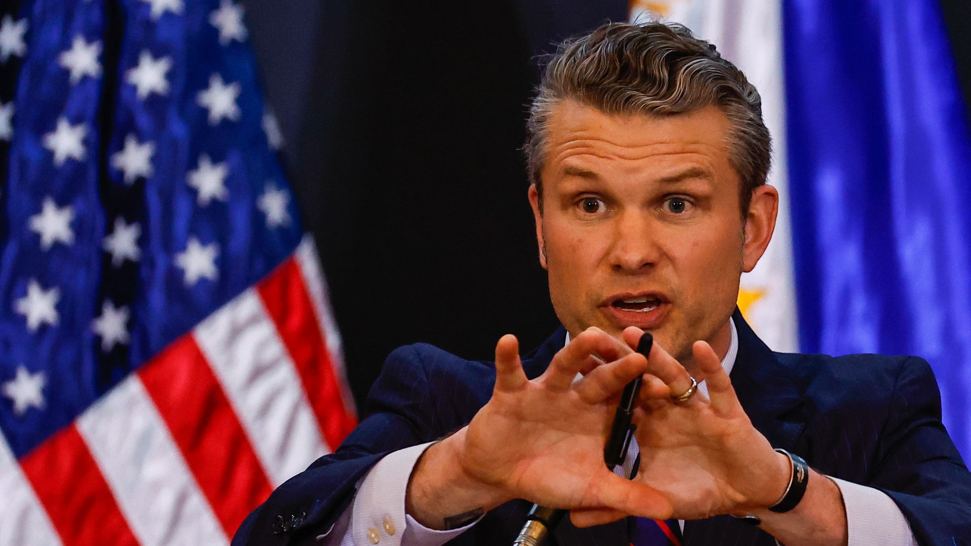  Secretary of Defense Pete Hegseth delivers a speech during a press conference, after meeting with Philippines Secretary of National Defense Gilbert Teodoro, at a military camp in Quezon City, Philippines, on March 28, 2025. 