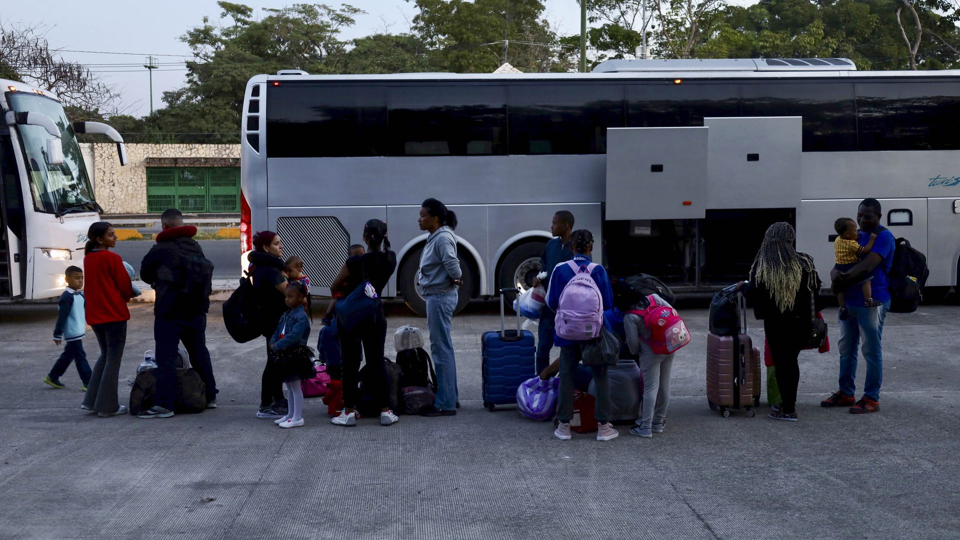 Migrants wait to board buses to travel to the border with the United States, days before Donald Trump takes office, in Tapachula, Mexico, on January 15, 2025. (Photo by Jose Torres/Anadolu via Getty Images)