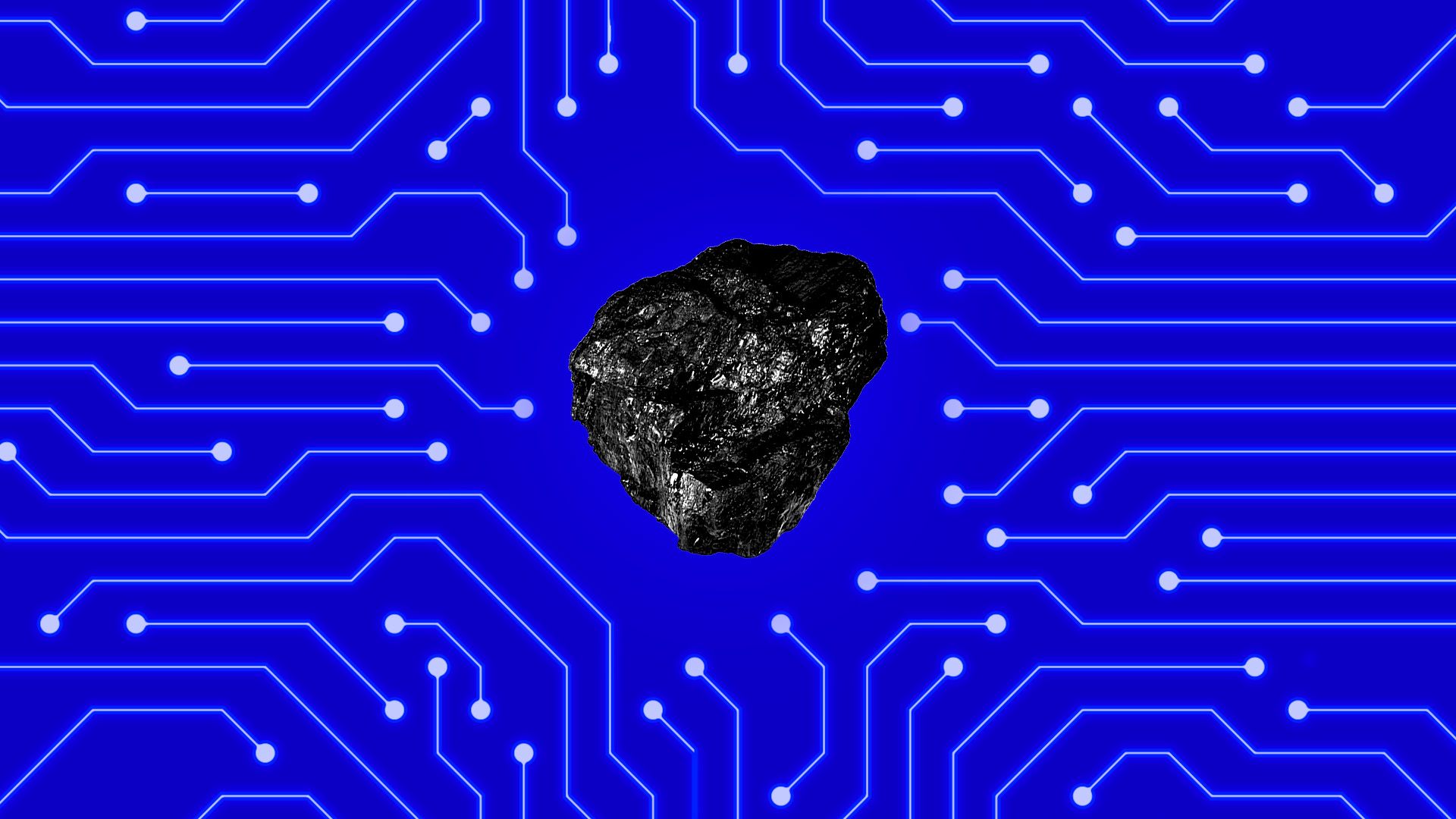 A lump of coal on top of a circuit board