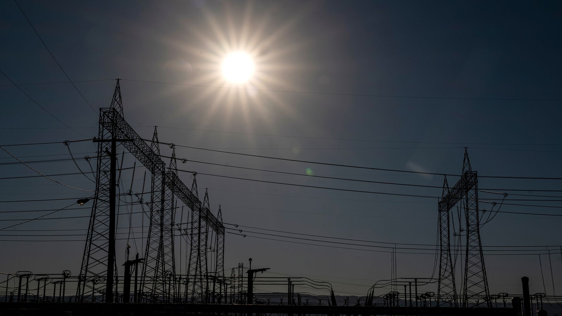 Electrical transmission towers at a Pacific Gas and Electric (PG&E) electrical substation during a heatwave in Vacaville, California, US, on Sunday, Sept. 4, 2022. 