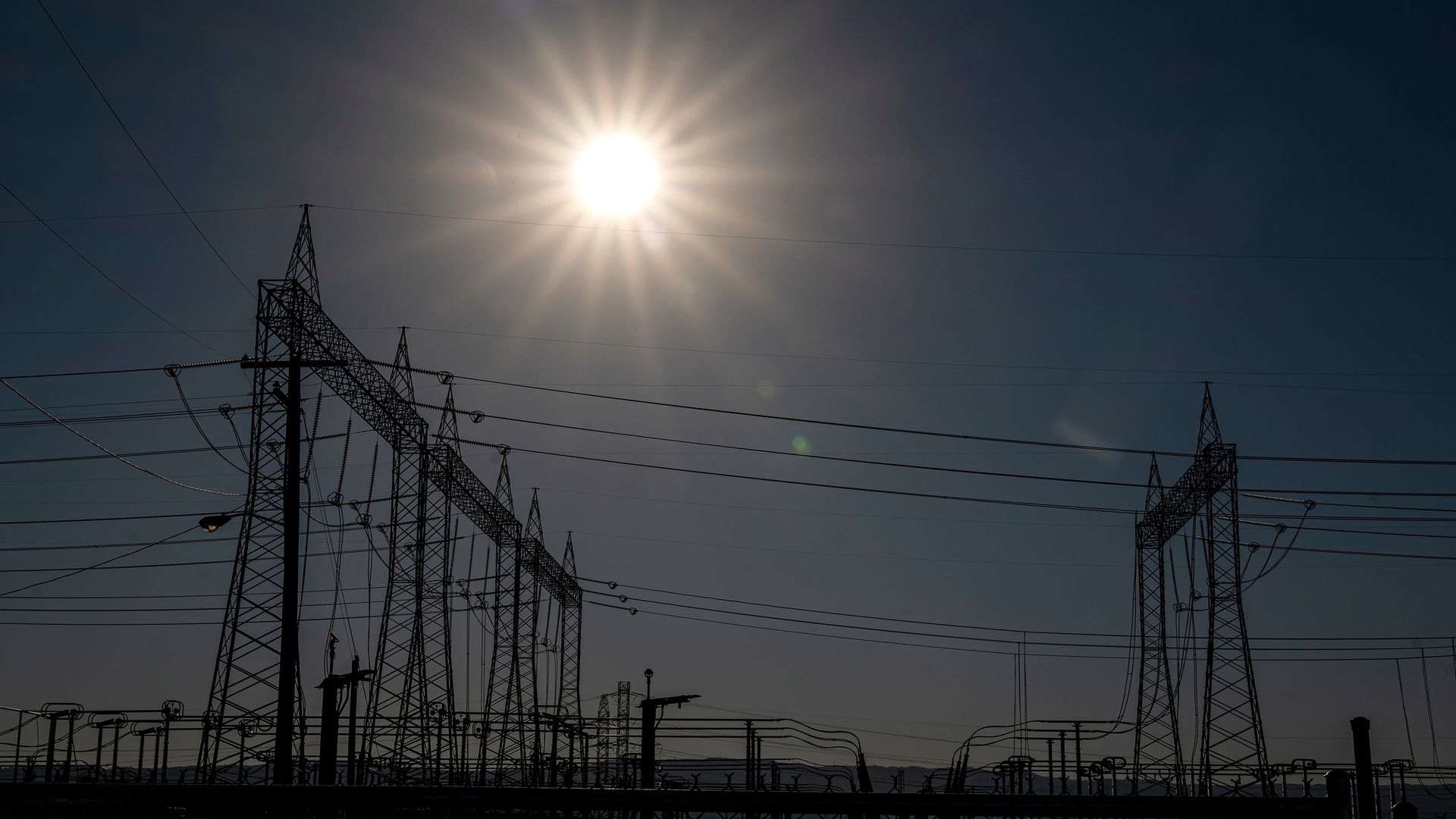 Electrical transmission towers at a Pacific Gas and Electric (PG&E) electrical substation during a heatwave in Vacaville, California, US, on Sunday, Sept. 4, 2022.